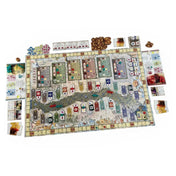 Az Aranyfolyó társasjáték teljes játéktérképe körül elhelyezett komponensekkel, játékos táblákkal és bábukkal, játék közbeni elrendezésben.