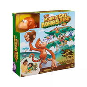A Monkey See Monkey Poo társasjáték doboza, rajta egy vidám majom illusztrációval, amely „dobásra” készül, valamint egy átlátszó ablakban a játékhoz tartozó majom figura látható.