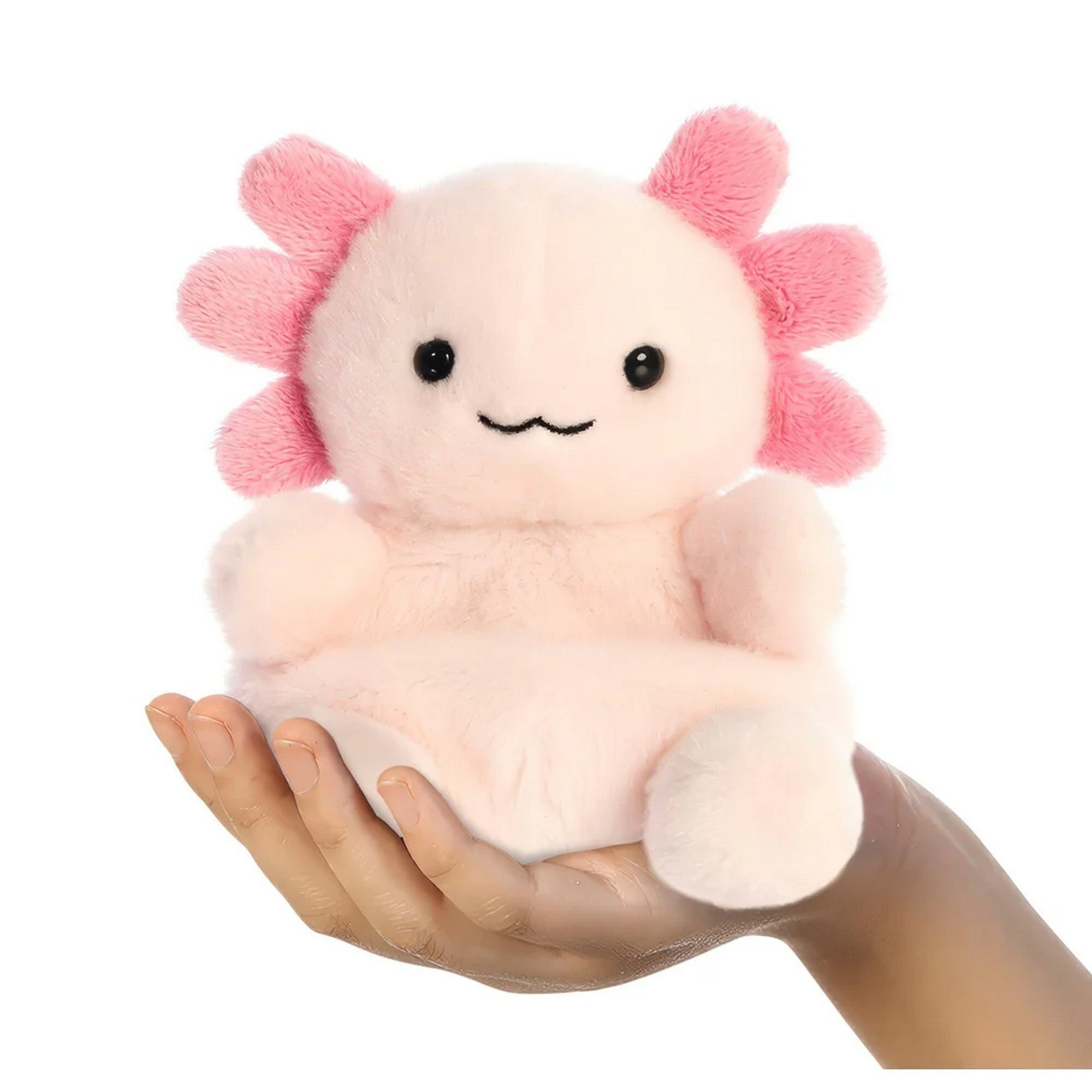 Rózsaszín axolotl plüss játék kézben tartva, mosolygós arccal, fekete szemekkel és puha, selymes tapintású anyagból készült aranyos kialakítással