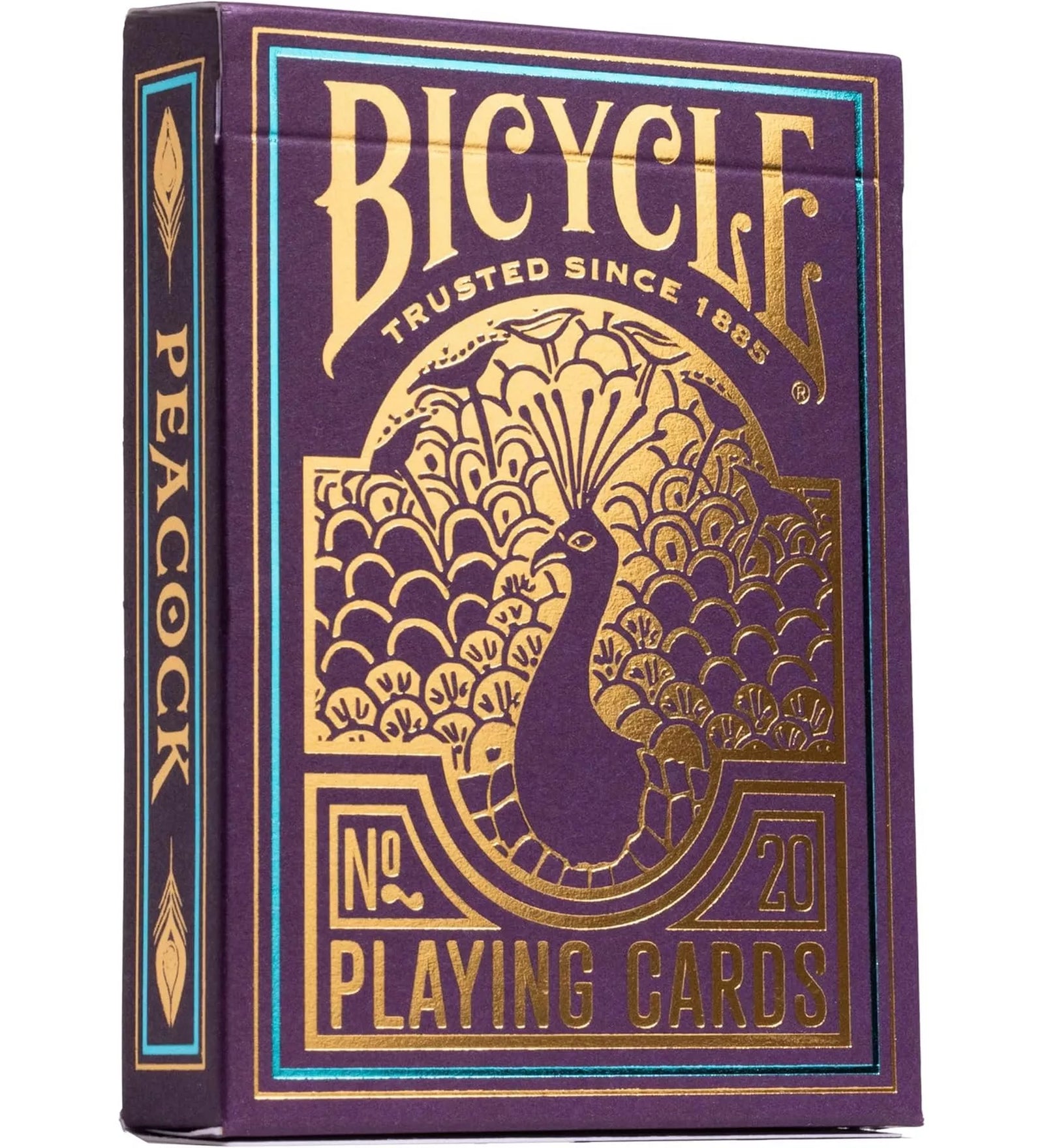 A Bicycle Peacock kártyapakli doboza lila alapon, arany dombornyomott páva mintával és „Playing Cards” felirattal, elegáns art deco stílusban.