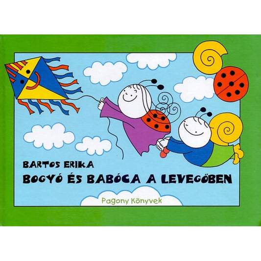 A Bogyó és Babóca a levegőben című könyv borítója, amelyen Babóca egy színes sárkányt reptet, Bogyó pedig a kezét fogva repül vele a felhők között.
