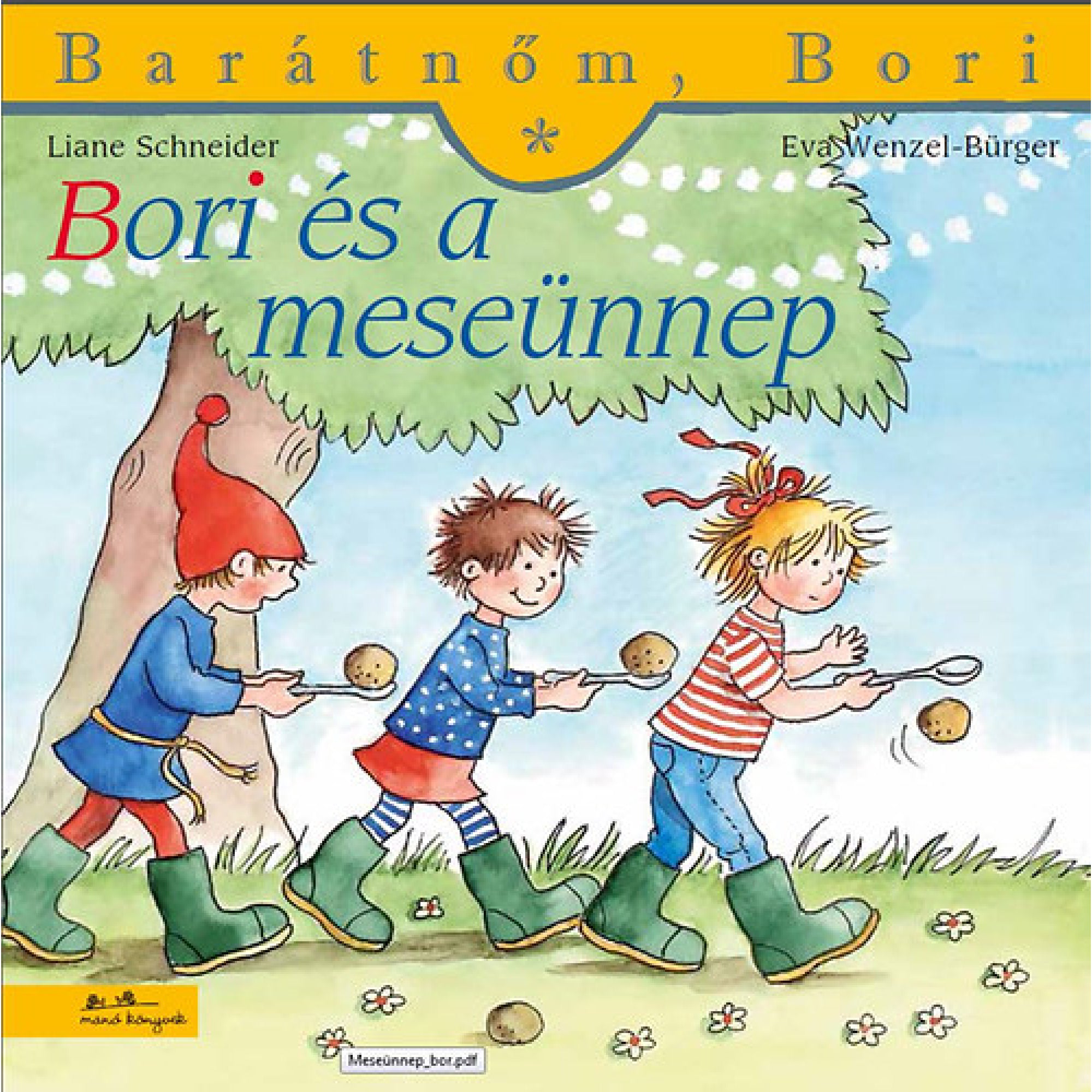 „Bori és a meseünnep” borító – Bori és két kisgyerek, tündérmesés jelmezben, örömmel vesznek részt egy játékos szabadtéri eseményen. A gyerekek diót egyensúlyoznak kanállal a fák alatt, mosolyogva futnak. A háttérben virágok, zöld fű és árnyékot adó fák láthatók, vidám, tavaszi hangulatot árasztva.