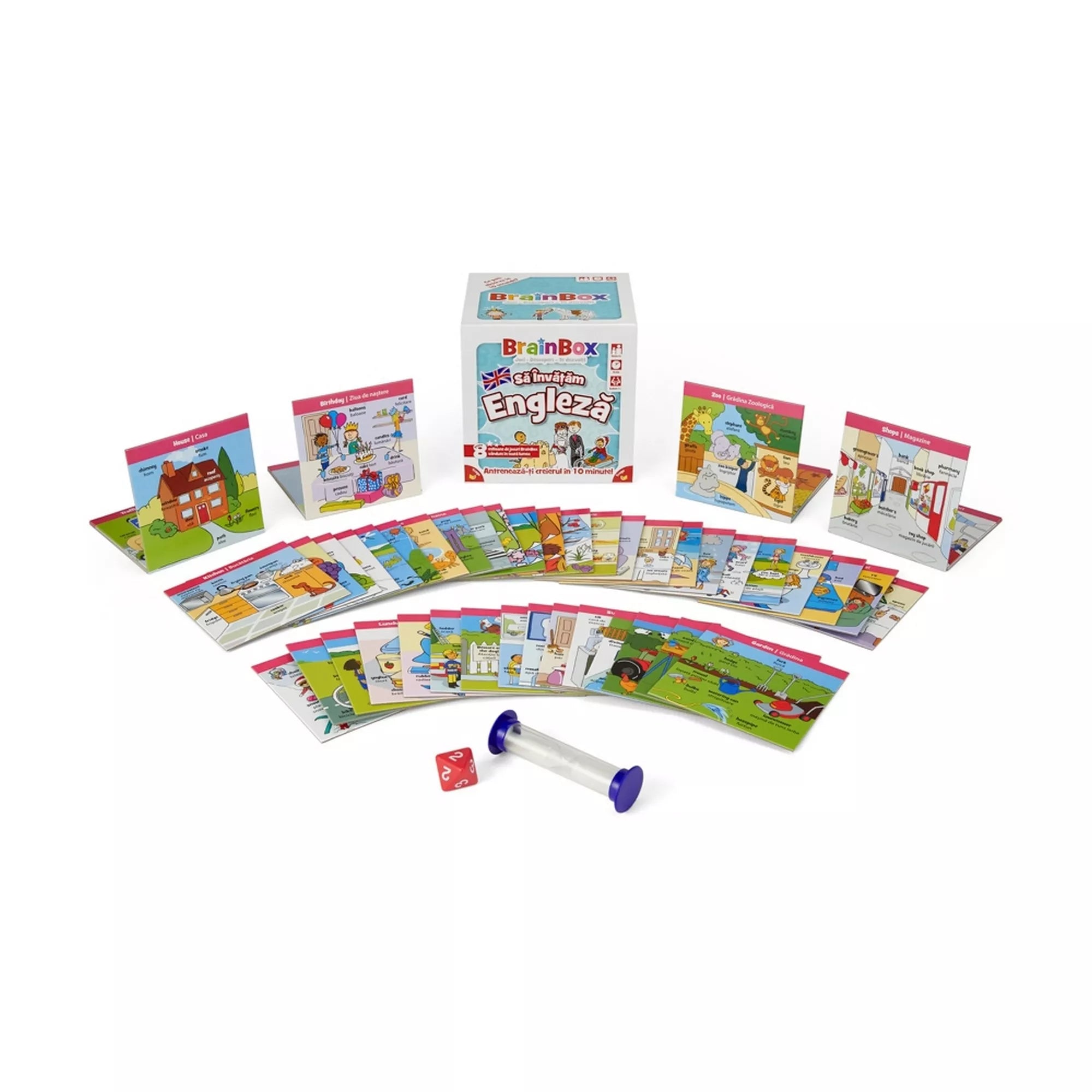 A BrainBox – Să învățăm Engleză játék tartalma: illusztrált tanulókártyák, homokóra és dobókocka a doboz mellett elrendezve. A kártyák különböző témákat mutatnak be, mint az iskola, város és mindennapi élet.