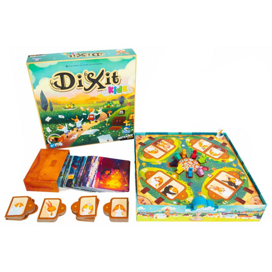 Dixit Kids társasjáték teljes tartalma kiterítve, dobozzal, kártyákkal, figurákkal és játéktáblával.