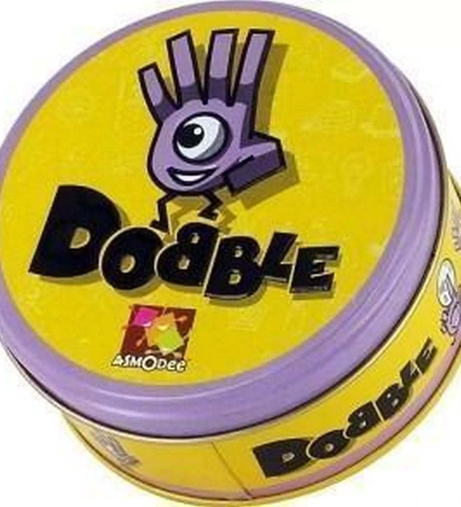 Dobble társasjáték doboza: Dobble társasjáték csomagolása, vidám sárga színben és jellegzetes, kerek formájú csomagolással.