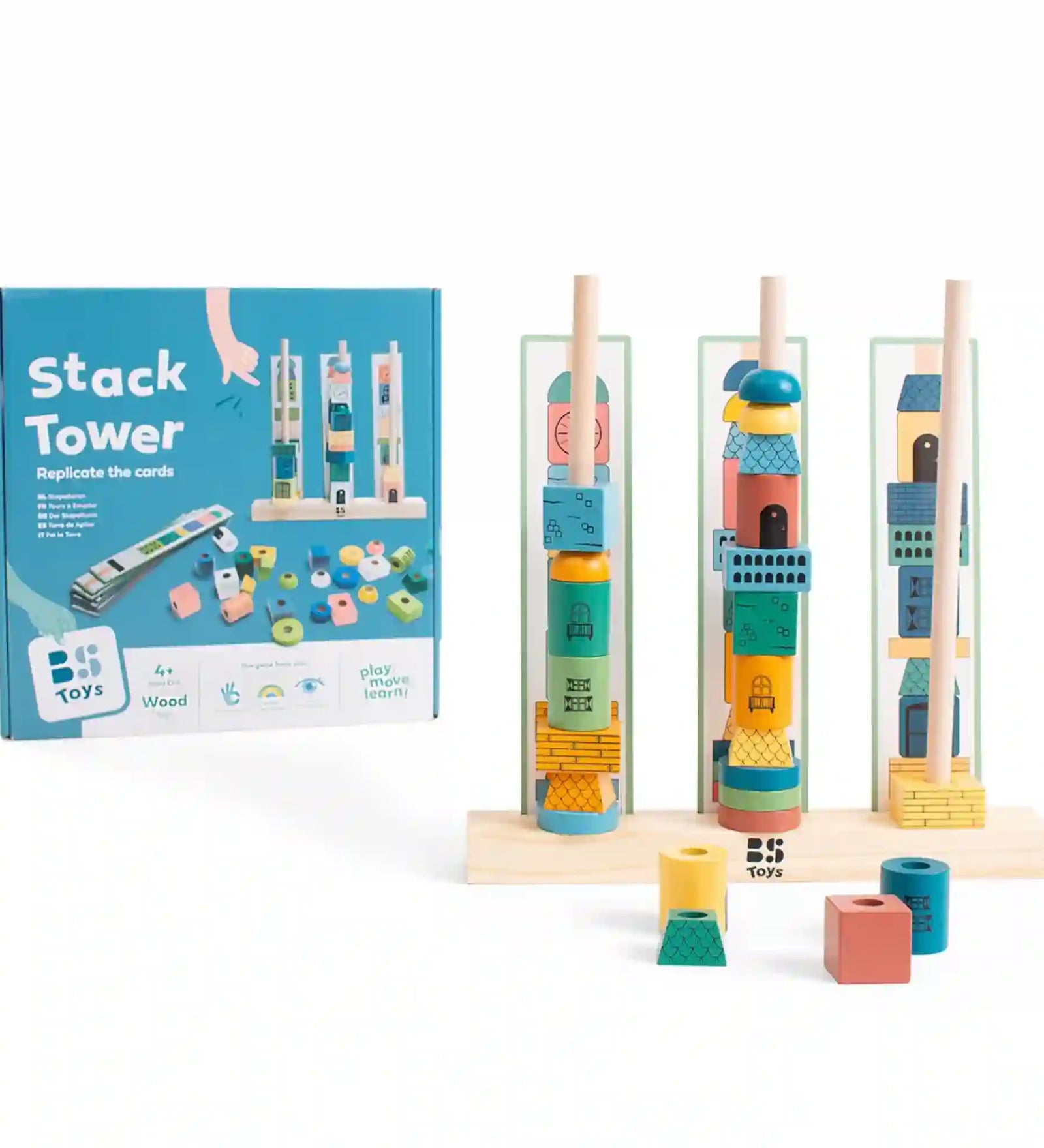 A BS Toys Stack Tower toronyépítő ügyességi játék teljes készlete a dobozzal együtt. A képen a három fa állvány, a különböző formájú és színű építőelemek, valamint a toronyépítő elemek láthatók, amelyekből a feladatkártyák mintái alapján kell tornyokat építeni. A játék fejleszti a finommotorikát, a térbeli tájékozódást, a koncentrációt és a problémamegoldó készséget.