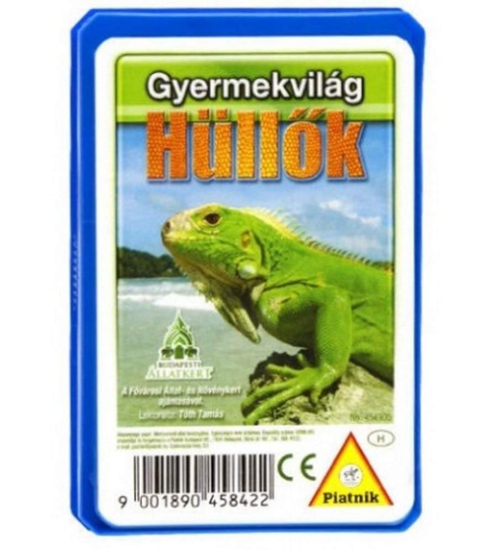 A képen a Gyermekvilág – Hüllők kvartett kártyajáték doboza látható. A borítón egy élénkzöld leguán figyel a háttérben trópusi tengerparti tájjal. A játékot a Piatnik adta ki, és a Fővárosi Állat- és Növénykert közreműködésével készült. A doboz alján a CE jelölés és a gyártói vonalkód is jól látható. Ez a 32 lapos kártyacsomag nemcsak szórakoztat, hanem hasznos ismereteket is ad a hüllők világáról – tökéletes választás kíváncsi gyerekeknek és természetbarát családoknak!