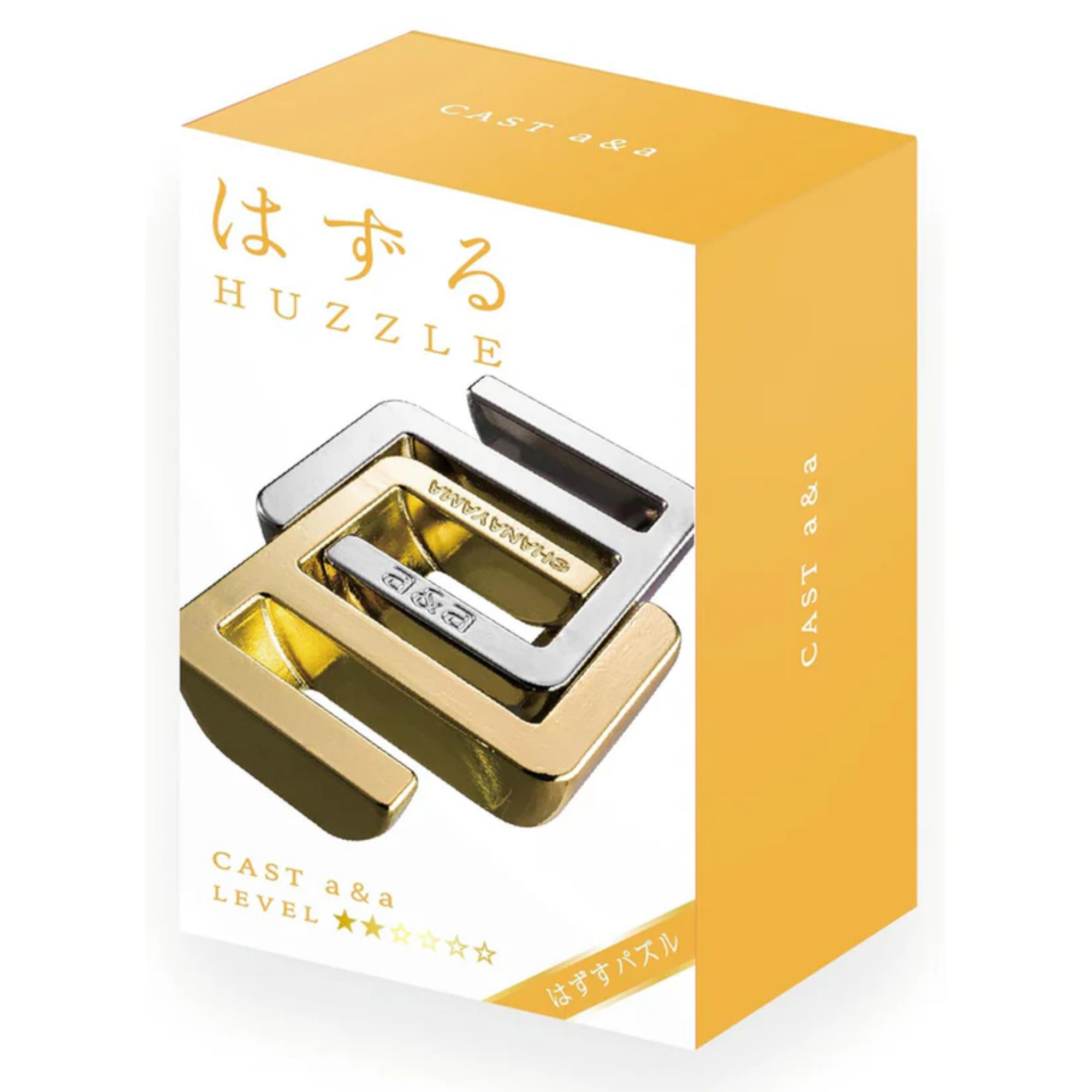 A Huzzle Cast A&A kirakó világos sárga doboza, rajta a termék neve, nehézségi szintje és a kirakó arany-ezüst színű, egymásba illeszkedő fém elemei, modern, letisztult dizájnna