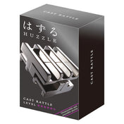 A Huzzle Cast RATTLE ördöglakat stílusos fekete dobozban, modern megjelenéssel és 5 csillagos nehézségi szinttel.