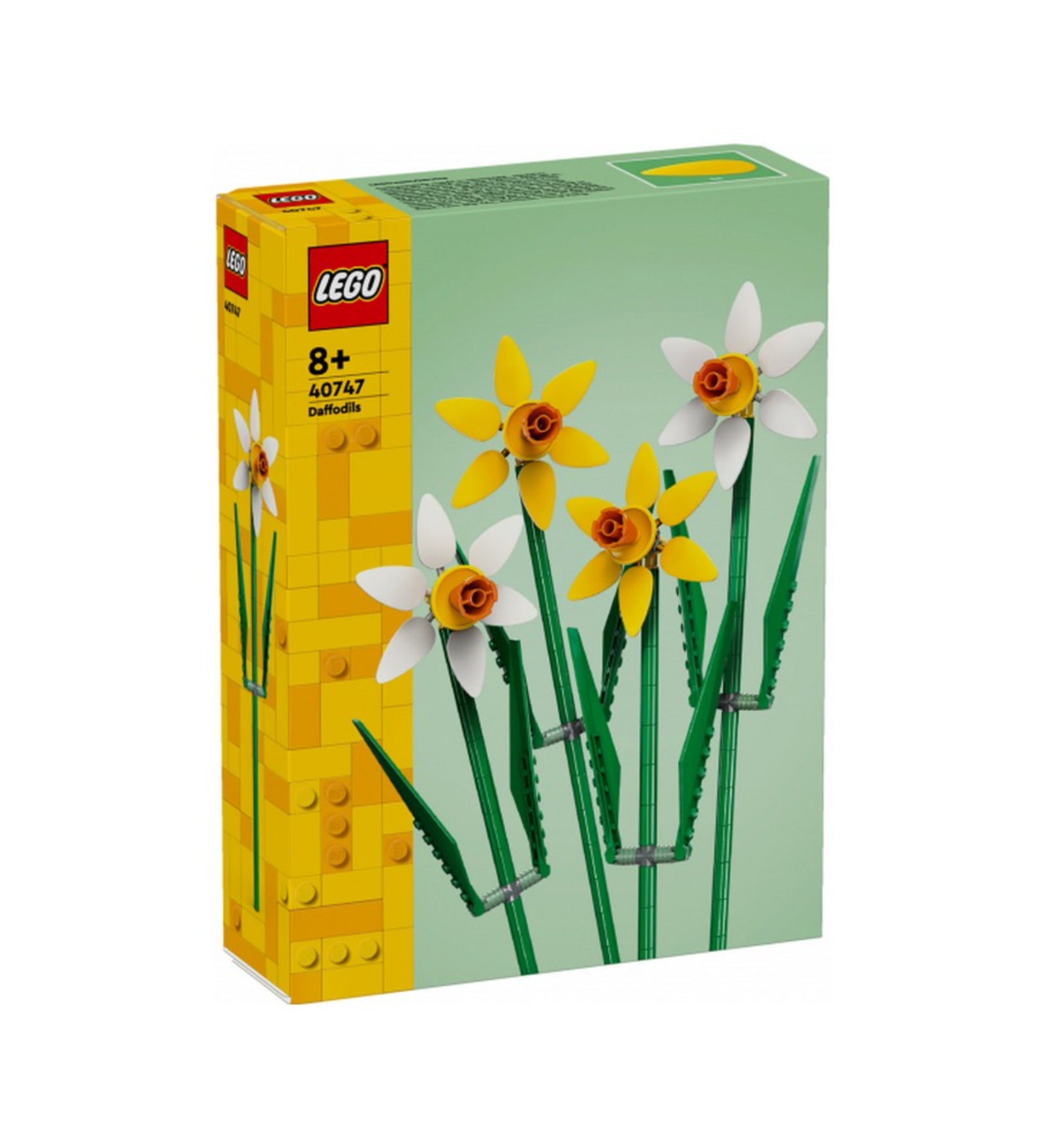 „LEGO Nárciszok (40747) készlet doboza négy, hosszú szárú, sárga és fehér LEGO nárcisszal zöld háttér előtt.”
