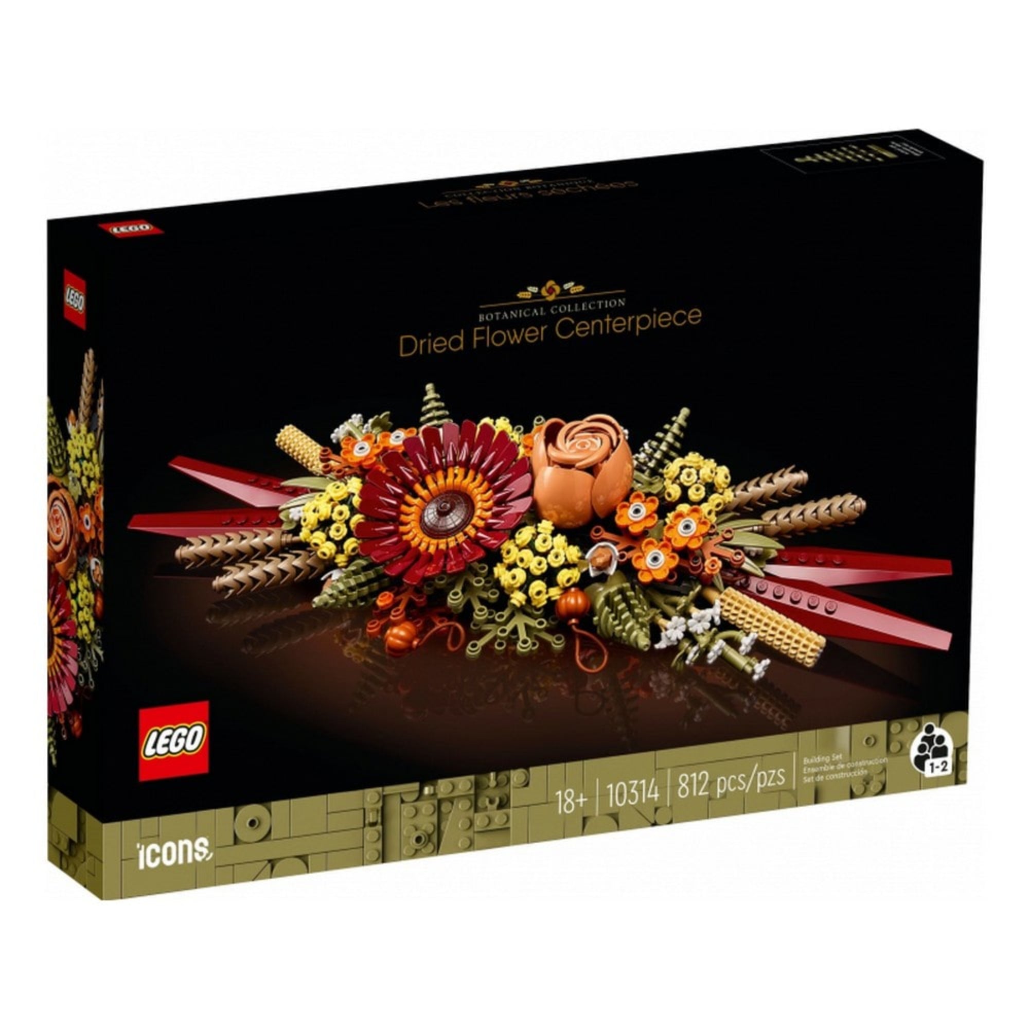 LEGO Dried Flower Centerpiece (10314) készlet doboza, amelyen a szárított virágokat ábrázoló dekoráció részletesen látható fekete háttér előtt.