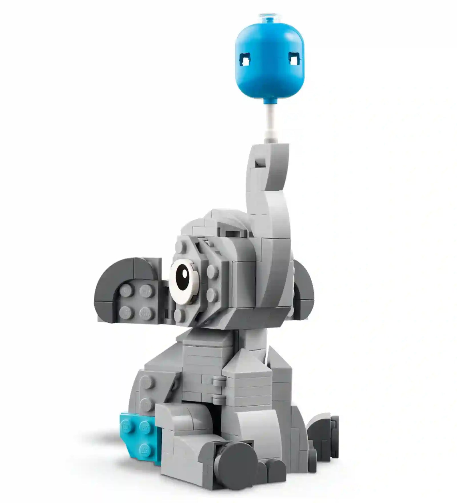 LEGO Baby Elephant in the Sky: Elefántbébi az égben 40814 készlet megépített modellje, amely egy aranyos szürke elefántbébit ábrázol, ormányán kék léggömbbel.