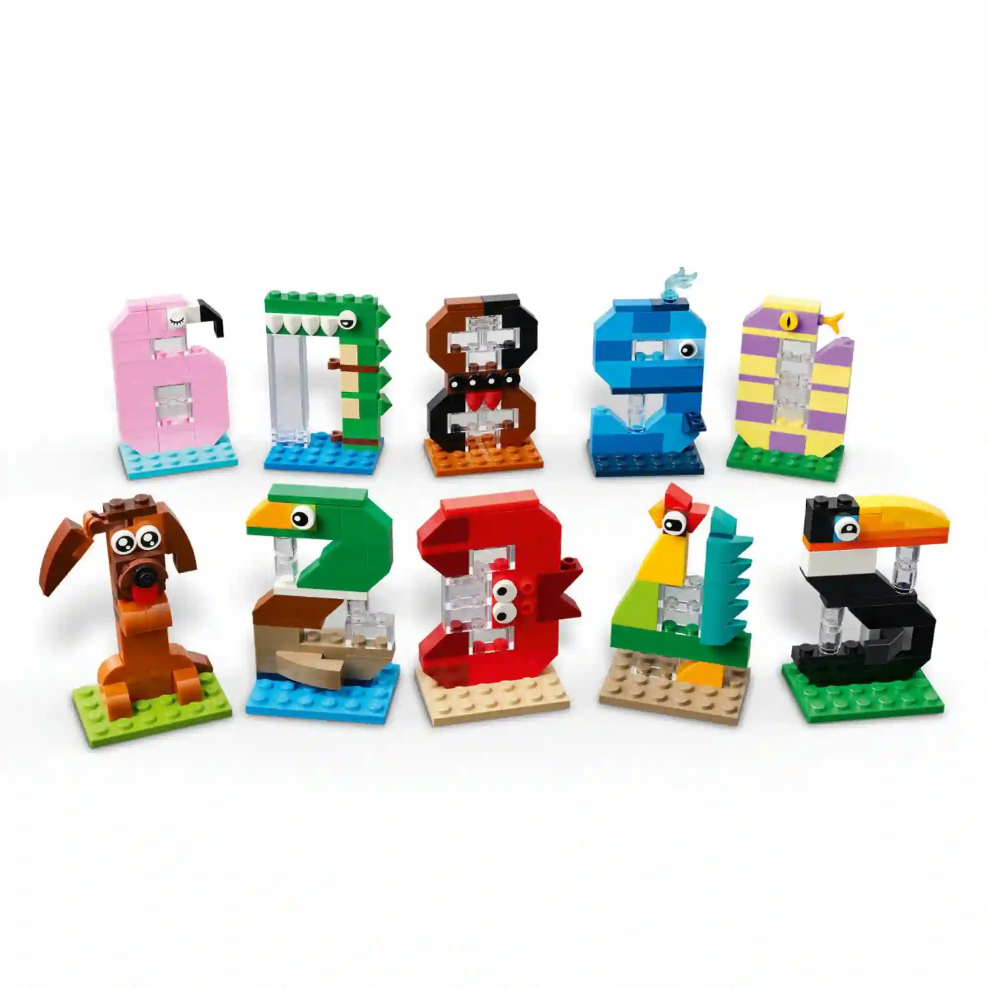 LEGO Birthday Numbers: Születésnapi számok 40807 készlet teljes tartalma, a 0–9 számok kreatív, állatmintás LEGO építményeivel és a hozzá tartozó díszdobozzal.