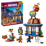 LEGO Fortnite: Durrr Burger étterem (77076) – a doboz, az épület és az összes minifigura kiegészítőkkel együtt elrendezve.