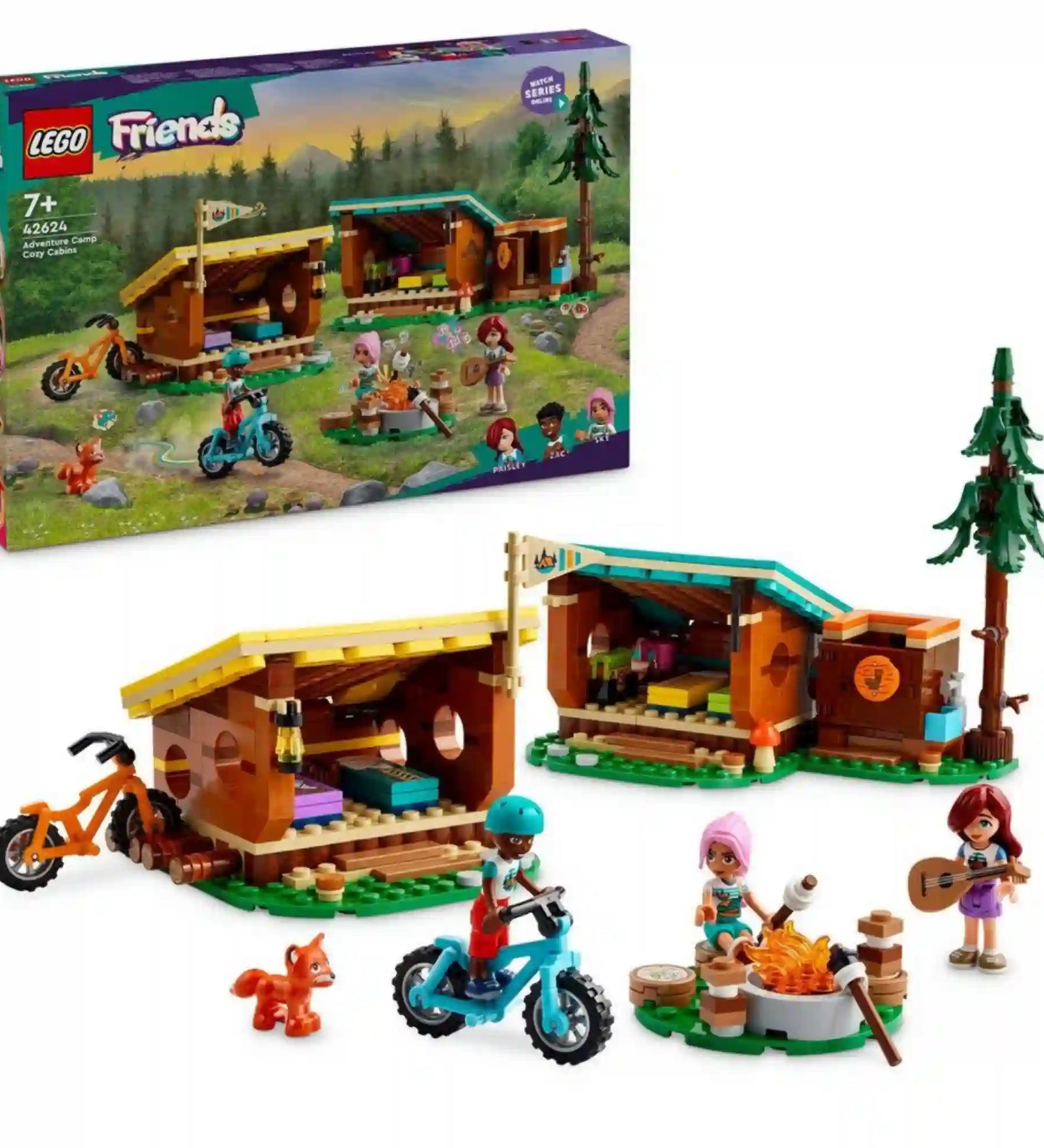 LEGO Friends 42624 készlet doboza és megépített modellje. A fotón a két kabin, a tábortűz, a kerékpárok, a fenyőfa, Paisley, Zac és Sky figurák, valamint a rókafigura részletesen láthatók.