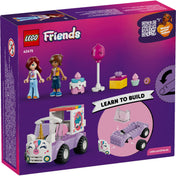 LEGO Friends Unicorn Cake Delivery Car (42675) hátoldali dobozkép, építési lépésekkel és a figurák bemutatásával.