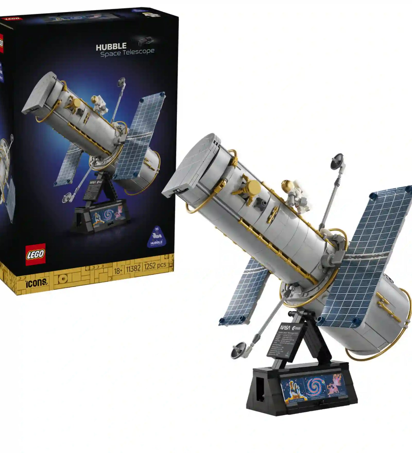 A LEGO Icons Hubble Űrteleszkóp 11382 épített modellje a készlet dobozával együtt.