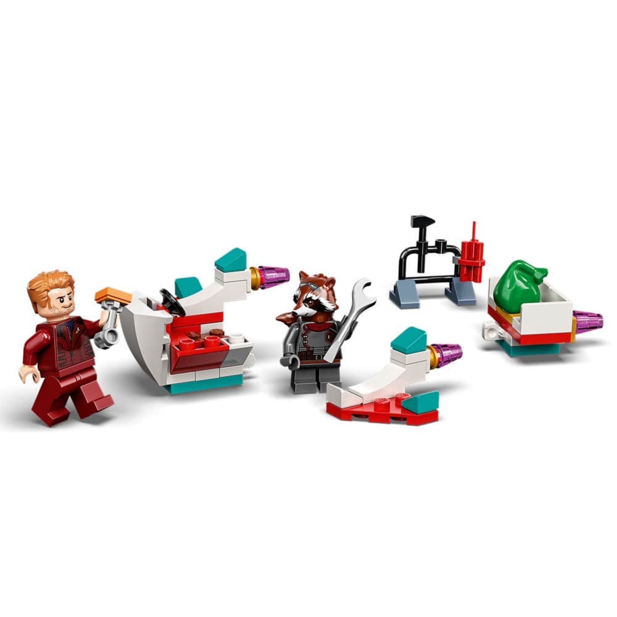 Star-Lord és Rocket minifigurák kis űrhajókat építenek; az asztalon szerszámok és egy mini laborállomás is található, karácsonyi hangulatban megalkotva.