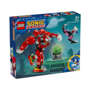 A képen a LEGO Sonic the Hedgehog sorozat „Knuckles’ Guardian Mech” (76996) nevű szettje látható. A dobozon egy nagy piros robot jelenik meg, amelyet Knuckles irányít. A robot masszív karokkal, erős lábakkal és részletes kialakítással rendelkezik, harcra készen áll. Mellette Rouge, a denevér repül támadó pózban, miközben célba veszi a kép közepén elhelyezett zöld káosz smaragdot, amely egy talapzaton világít.A dobozon a jól ismert Sonic the Hedgehog logó látható, valamint Sonic portréja is megjelenik.