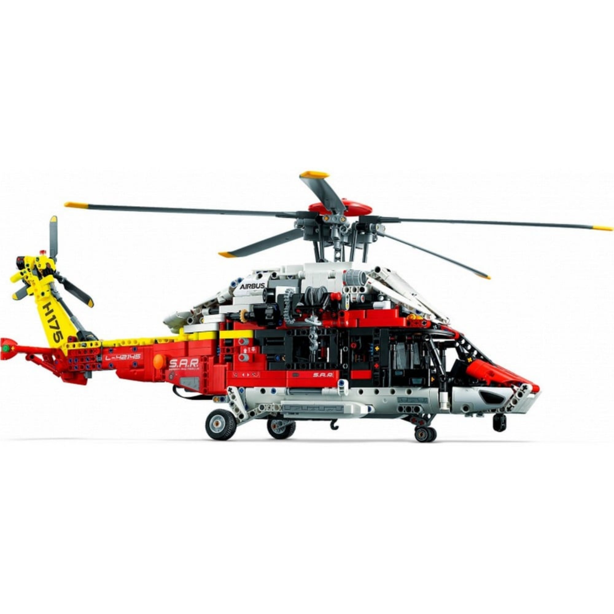 A LEGO Technic Airbus H175 másik oldali nézete, jól látható szerkezeti részletekkel, nyitható panelekkel és a farokrész propellerével.