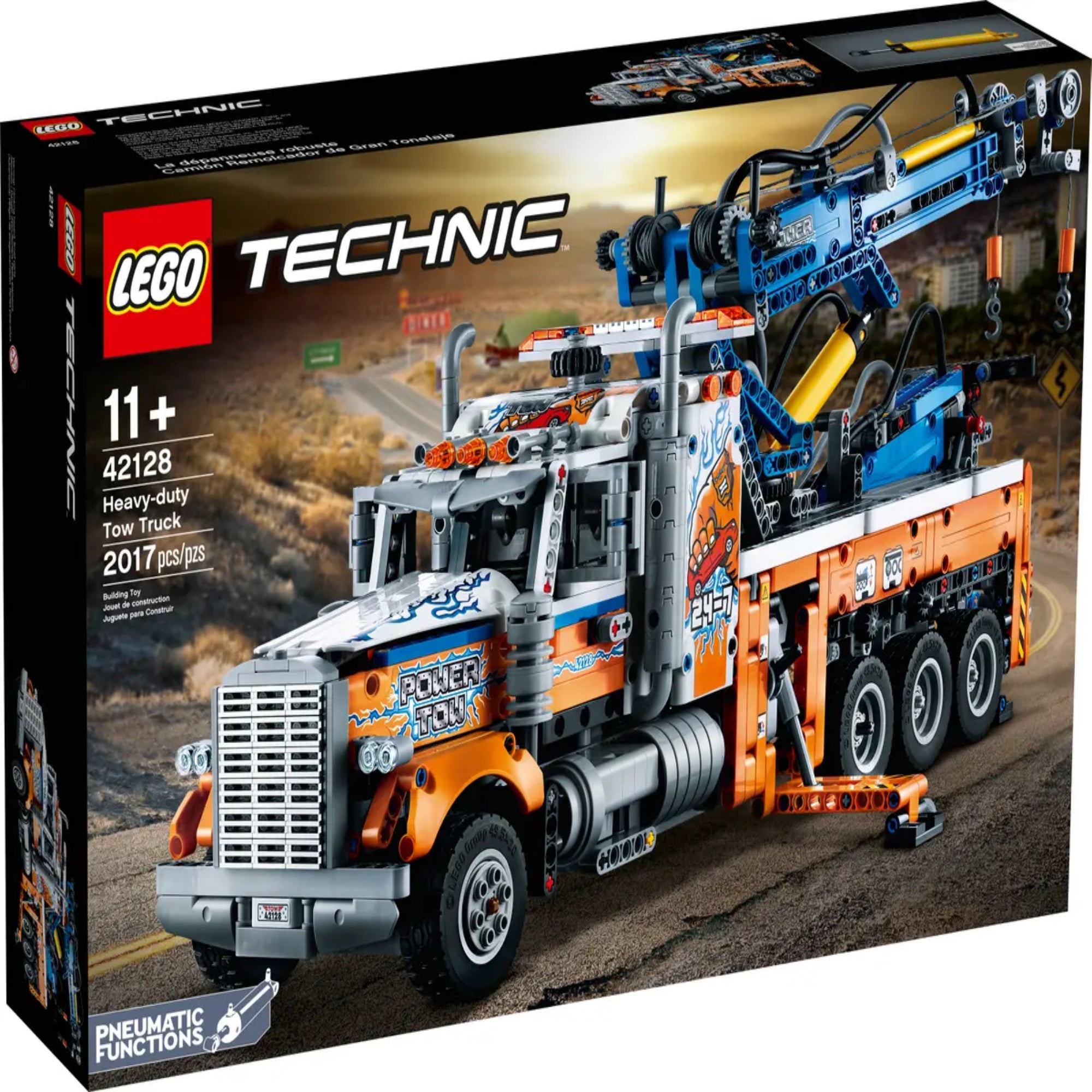 A LEGO Technic Nagy teherbírású vontató (42128) 2017 darabos készletének doboza, amelyen a részletesen kidolgozott narancssárga és kék vontató látható egy országúti háttérrel.
