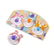 Melissa & Doug First Play farm óriás gombos puzzle darabokkal, ahol a levehető állatfej elemek és a fa alaplap külön is látható.