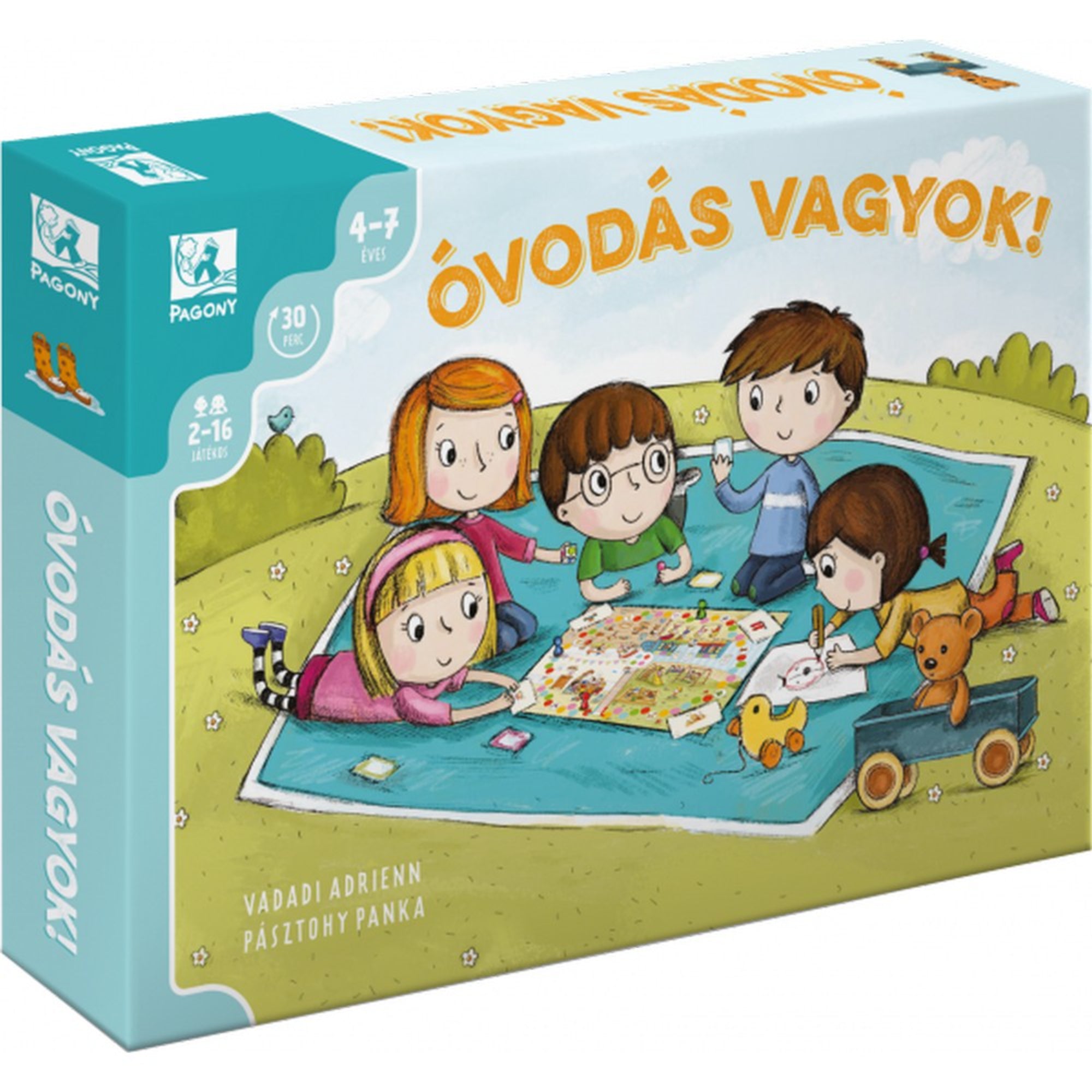 Óvodás vagyok! társasjáték dobozának borítója, amelyen egy rajzolt piknik jelenet látható. Négy óvodás korú gyerek ül egy kék takarón a szabadban, miközben társasjátékoznak és rajzolnak. A háttérben zöld fű és bokrok, valamint egy játék mackó és egy kiskocsi is látható. A dobozon az ajánlott korosztály (4-7 évesek) és a játékidő (30 perc) is feltüntetve.