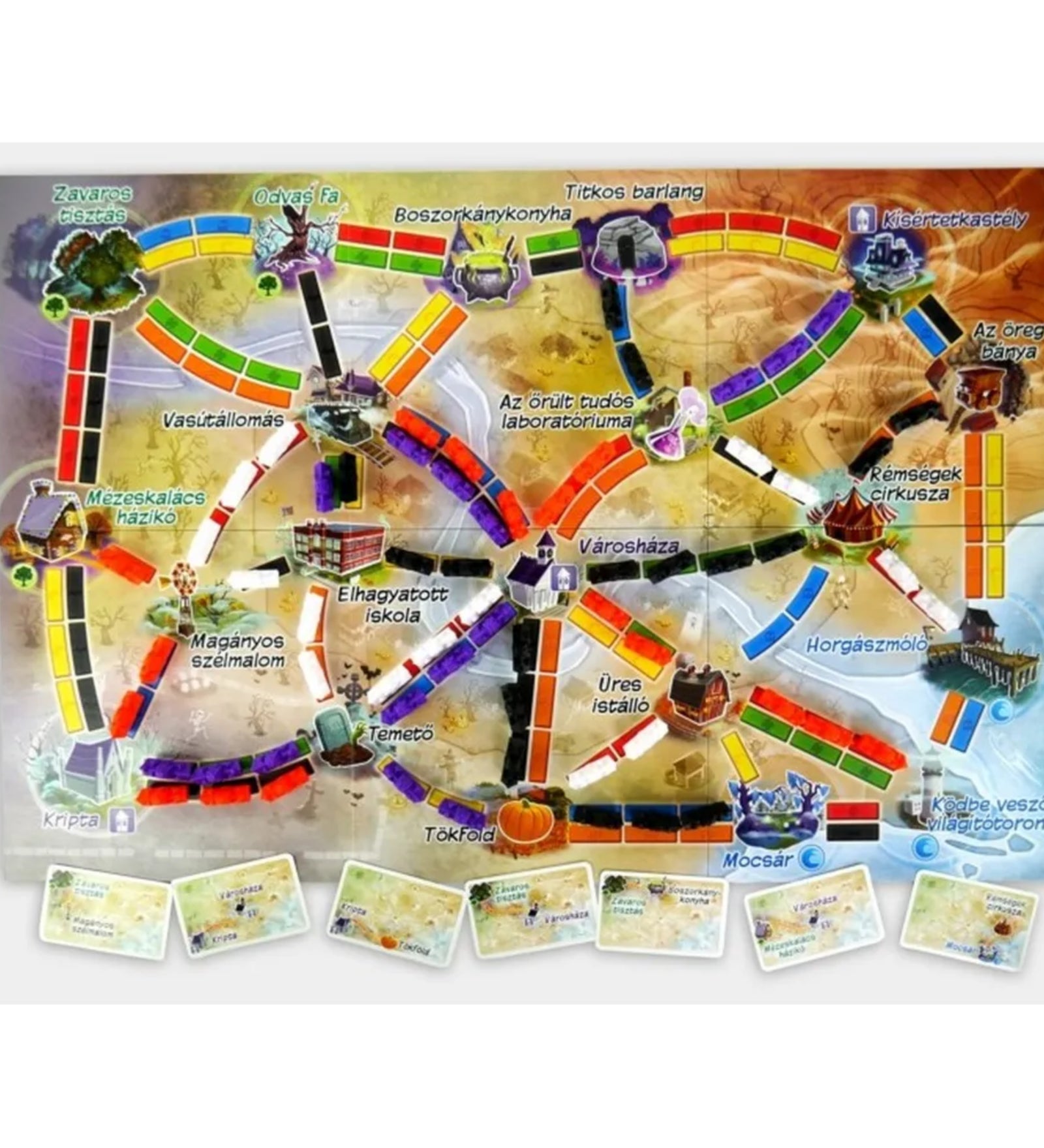 A Ticket to Ride: Szellemvonat játéktáblája közelről, különböző Halloween témájú helyszínekkel, mint Tökföld, Kísértetkastély és Mézeskalács házikó.
