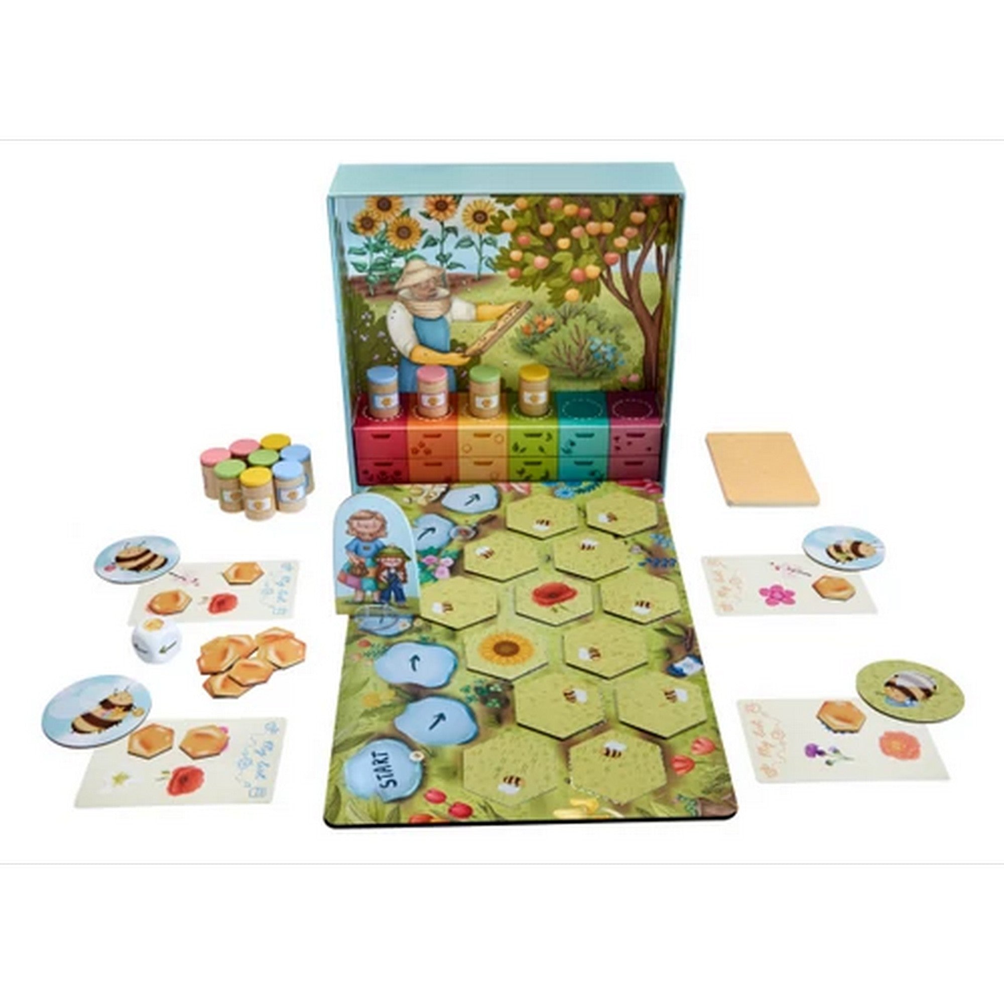 A Zümmögő társasjáték játéktáblája és elemei játék közben: hatszögletű mezők, méhecskés korongok, színes mézeskedék és virágos háttér illusztrációk.