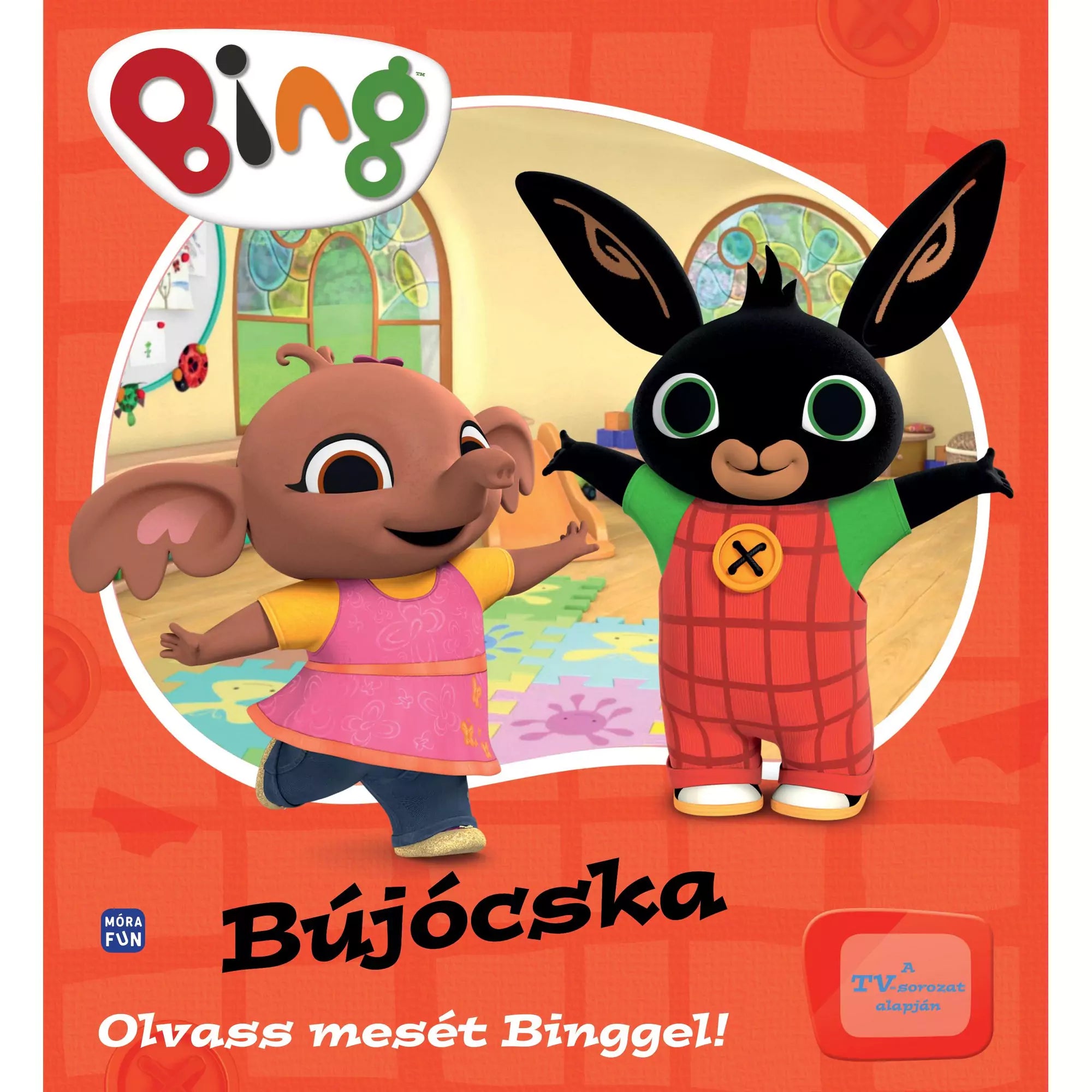 „Bing – Bújócska” című gyerekkönyv borítója, amelyen Bing, a fekete nyuszi piros ruhában és barátja, Sula, a rózsaszín ruhás elefántlány mosolyogva tárják szét karjaikat egy vidám, színes játszószobában.