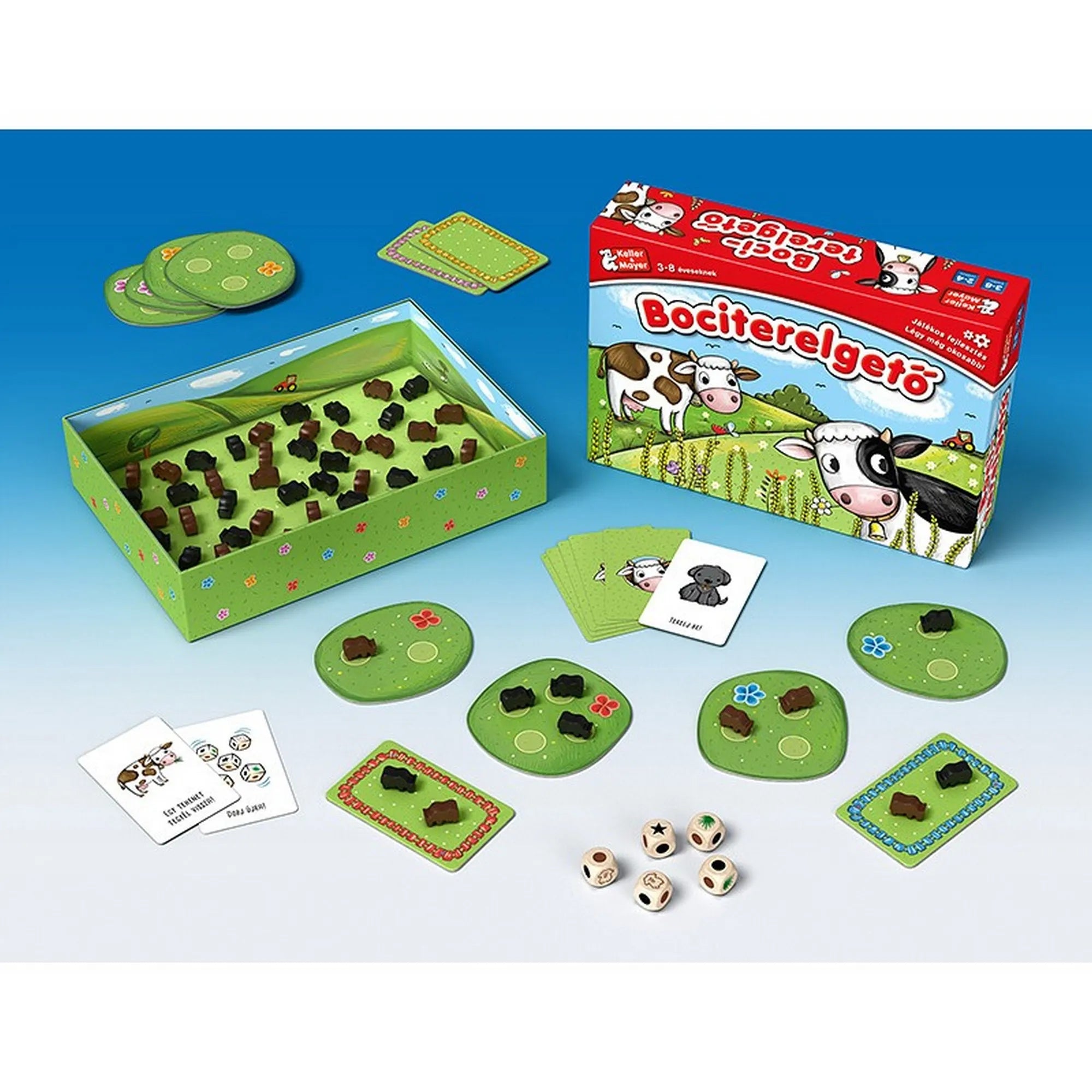 A Bociterelgető társasjáték tartalma: zöld legelőlapkák, fa bocik, dobókockák, kártyák és a nyitott dobozban elhelyezett bábuk.