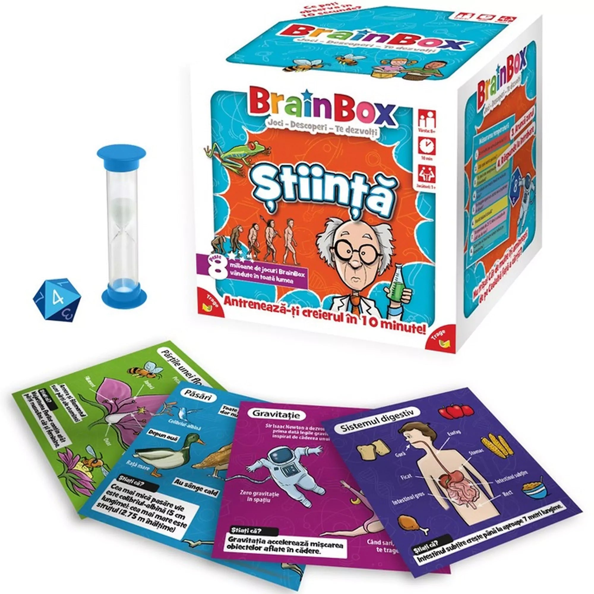 A BrainBox: Știință játék tartalma kibontva: a doboz mellett egy homokóra, egy kék dobókocka és több színes kártya, rajtuk tudományos témák, mint gravitáció, emésztőrendszer és madarak.
