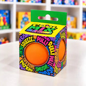 Cool Mix színváltós squishy stresszlevezető játék (narancssárga), színes feliratokkal díszített dobozban, két kerek nyíláson keresztül látható narancssárga labdával.