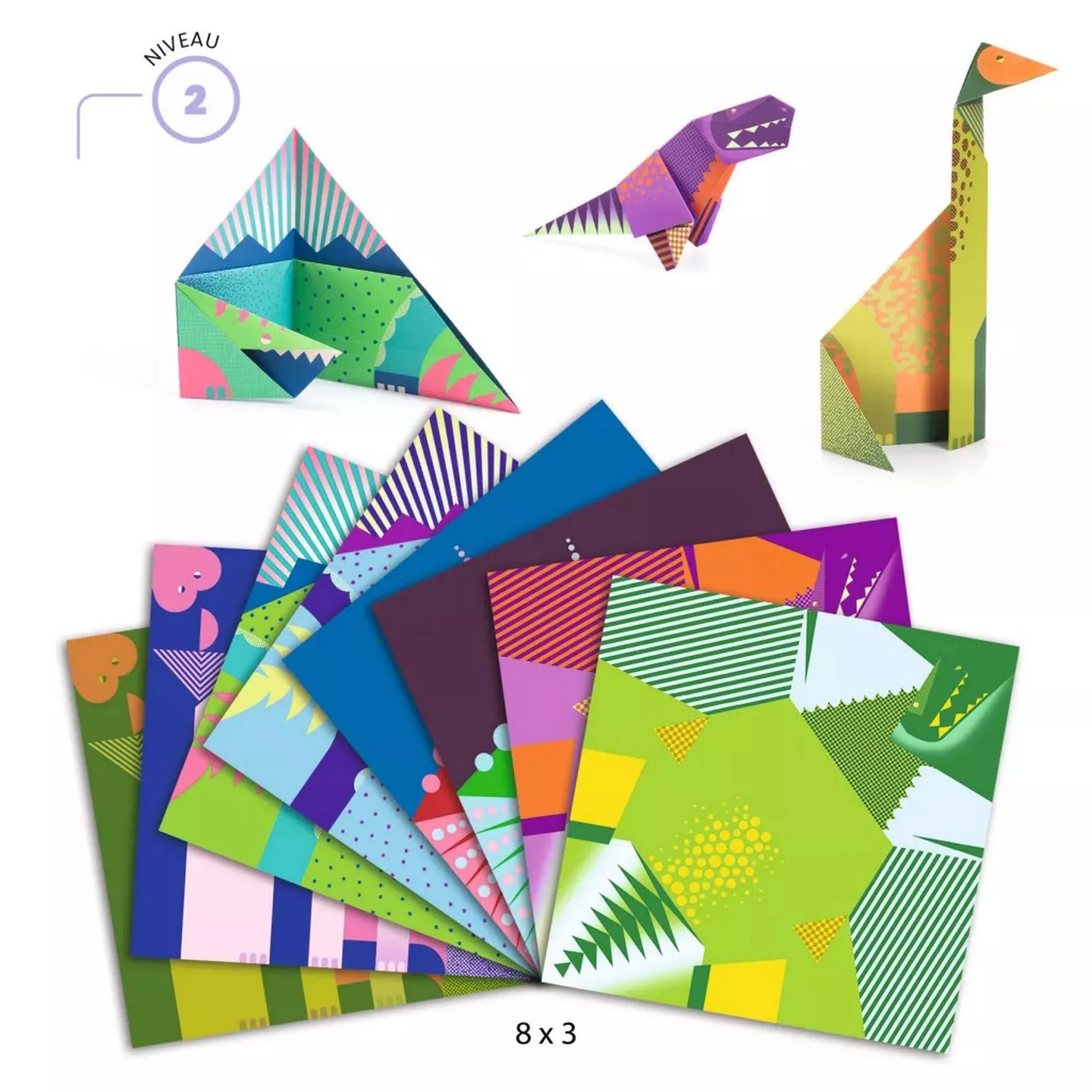 „A készlet 24 origamipapírja legyezőszerűen elrendezve: élénk zöld, sárga, türkiz, lila és kék színű lapok, dinoszaurusz mintás grafikai elemekkel, a bal felső sarokban a ’Niveau 2’ jelzéssel.”