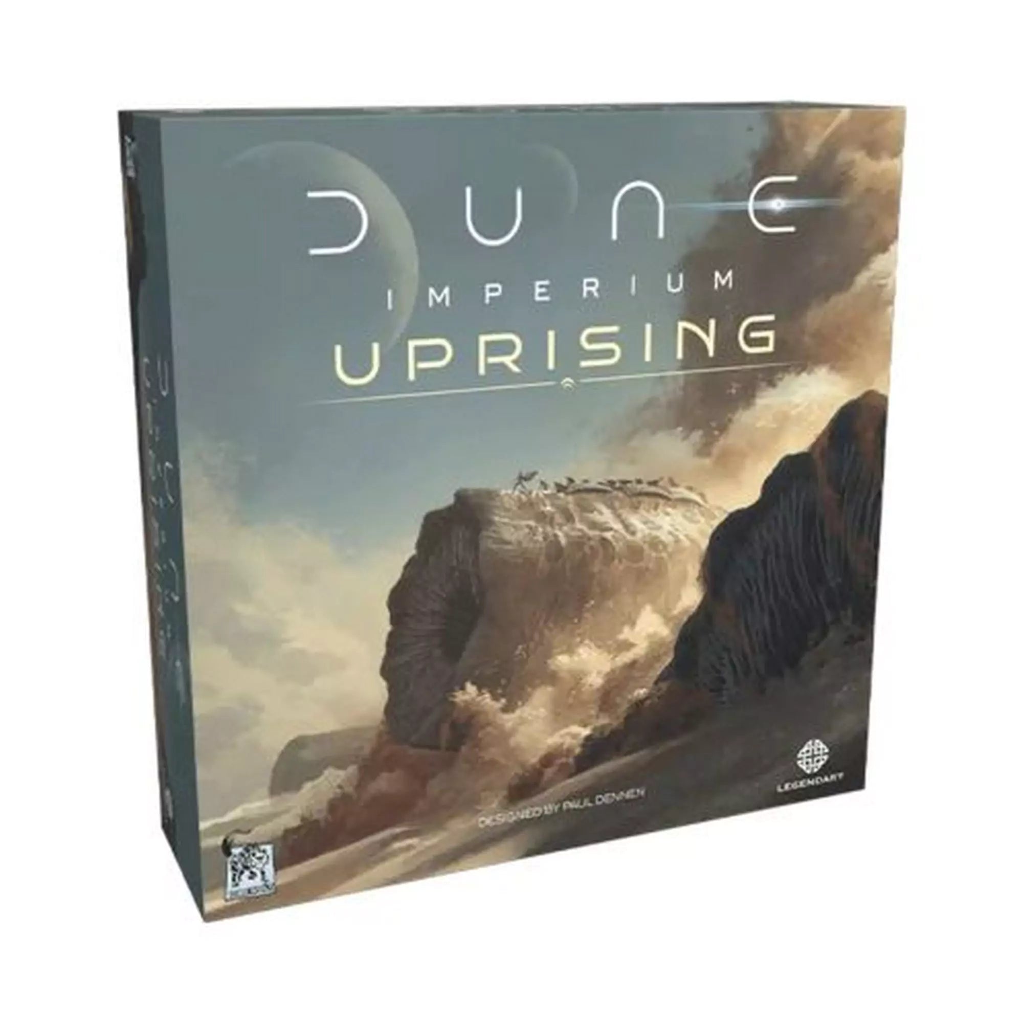 A Dune: Imperium - Uprising társasjáték doboza, amelyen egy ikonikus sivatagi táj látható, viharos égbolttal.