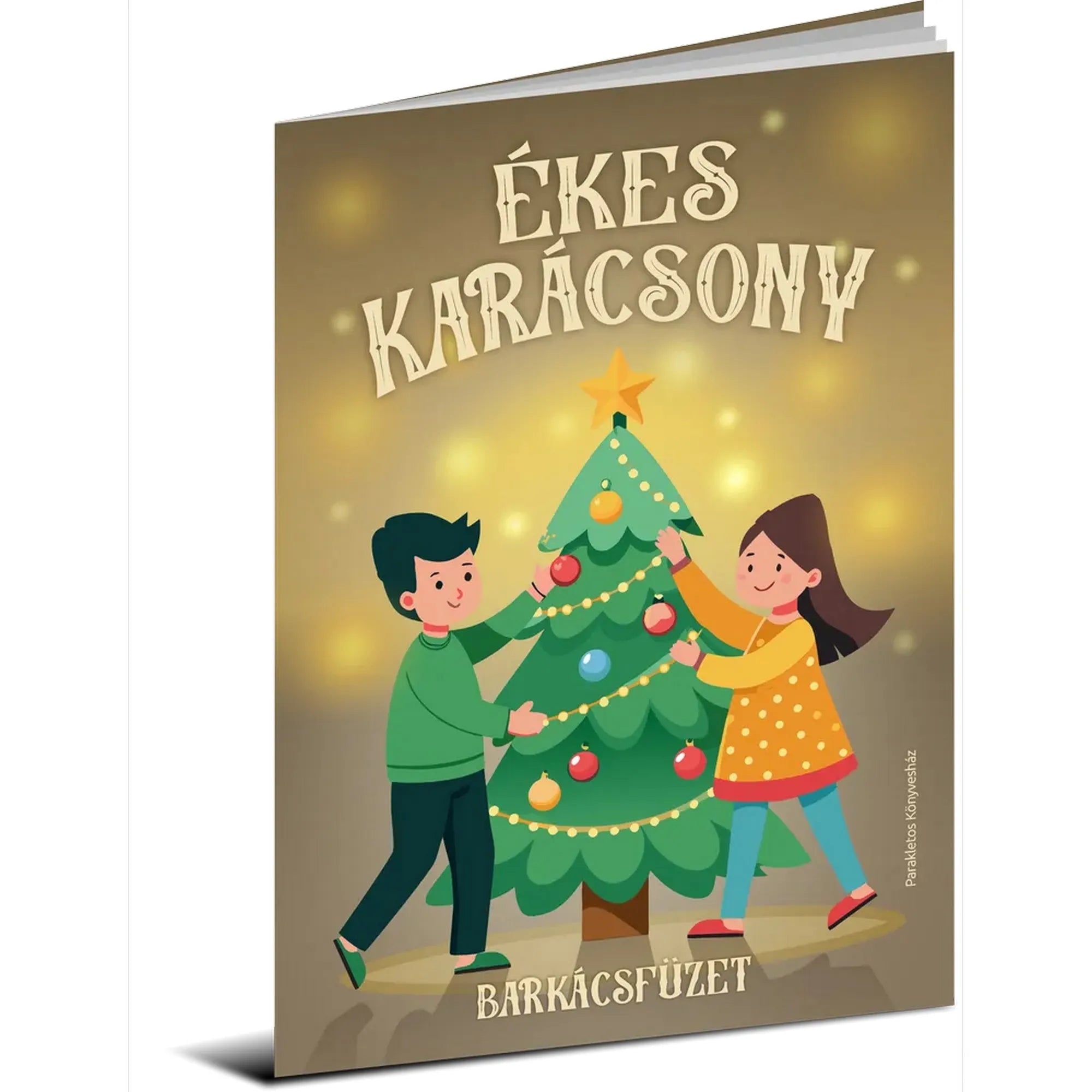 Ékes Karácsony barkácsfüzet borítója, amelyen egy kisfiú és egy kislány együtt díszít egy feldíszített karácsonyfát csillogó háttér előtt.