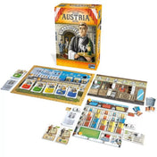 Grand Austria Hotel társasjáték teljes tartalma kiterítve, játéktáblák és kártyák