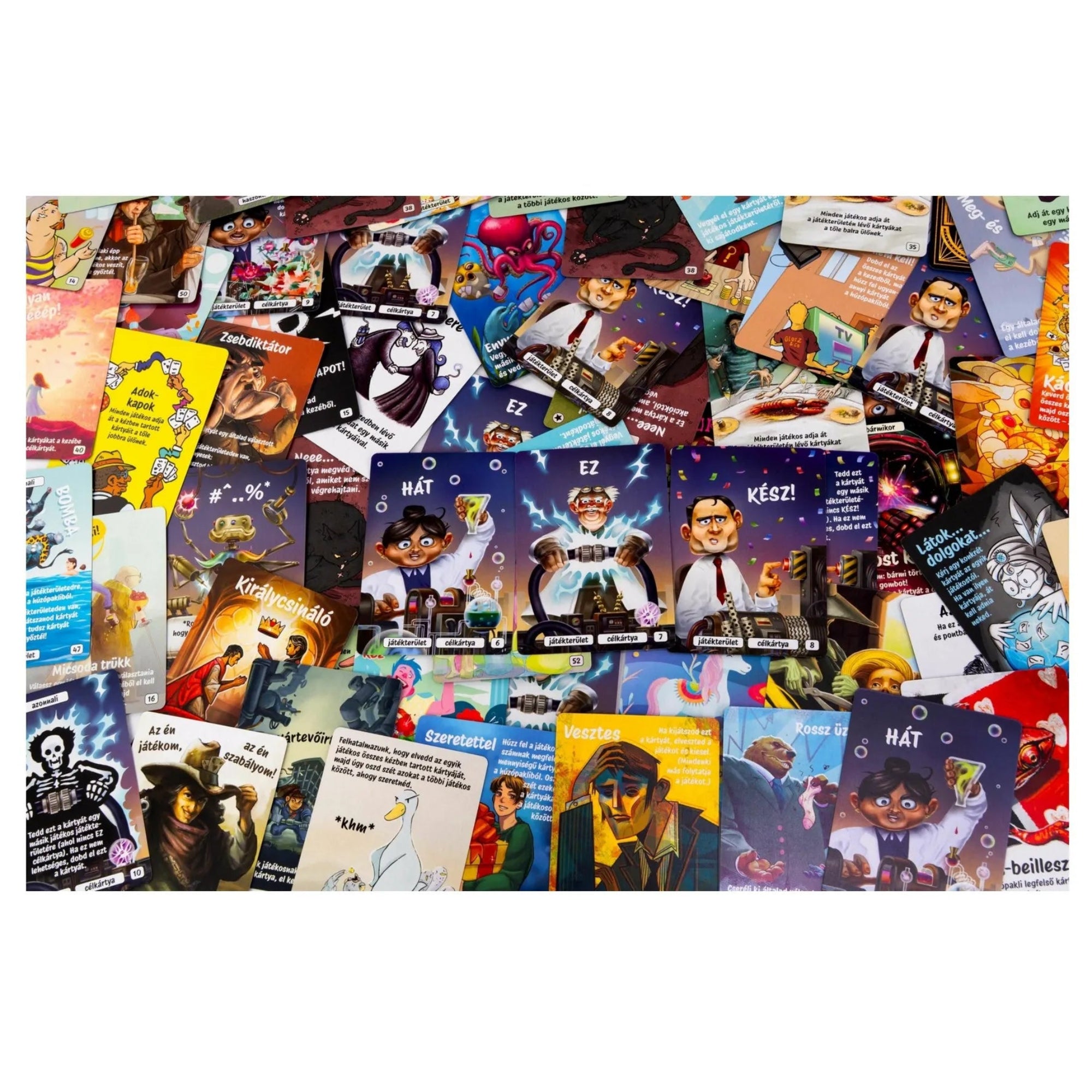 A Hát ez kész! társasjáték sokféle, színes illusztrációjú kártyáinak nagy, szétszórt gyűjteménye.