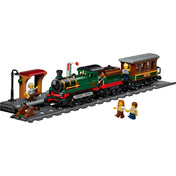 LEGO City Veterán gőzvonat 60511 készlet zöld gőzmozdonnyal, személykocsival, állomásperonnal és minifigurákkal vasúti pályán.
