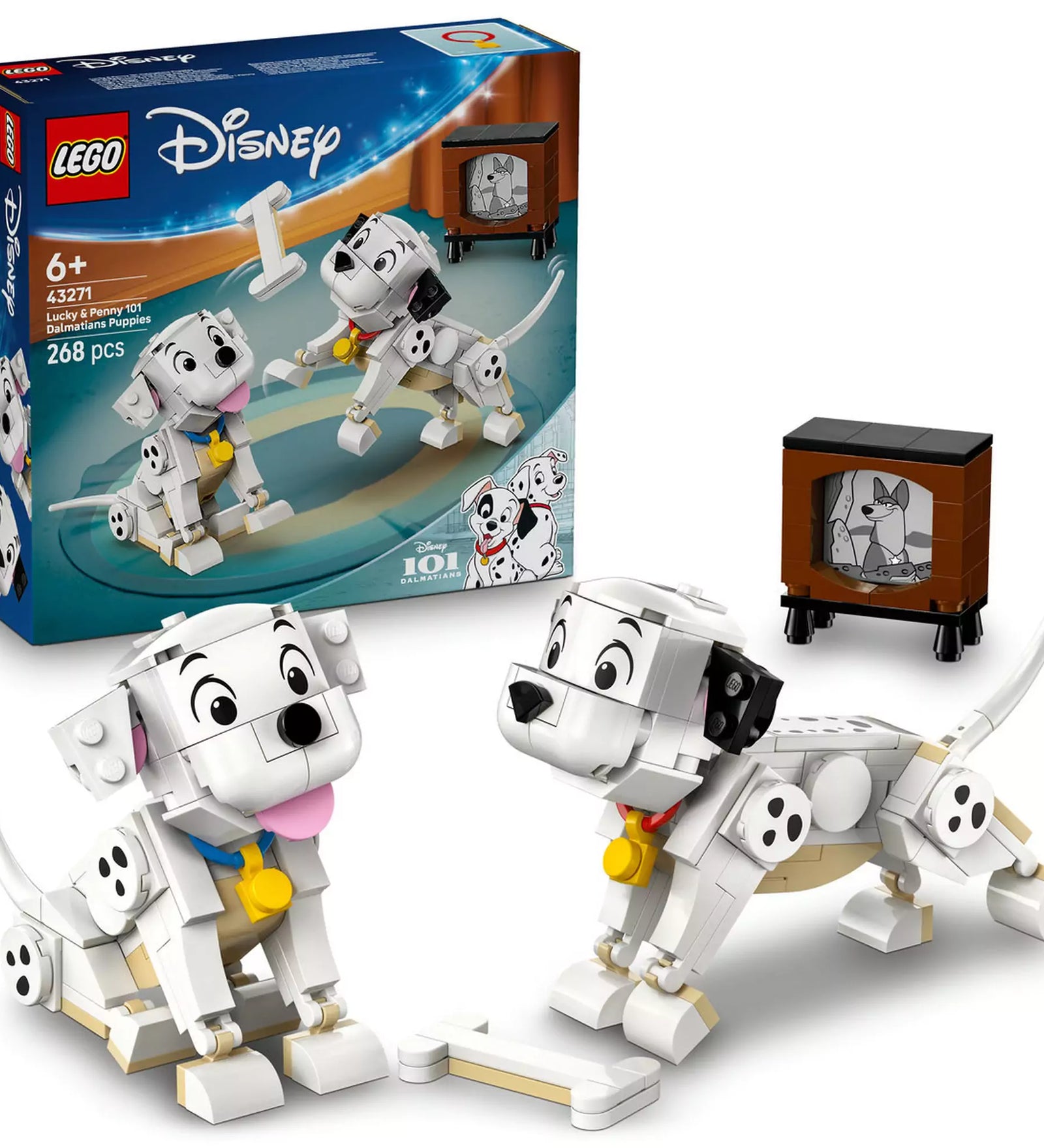 LEGO Disney Lucky és Penny kiskutyák (43271) készlet tartalma: a két kiskutya, a televízió és a csont a doboz előtt elhelyezve.