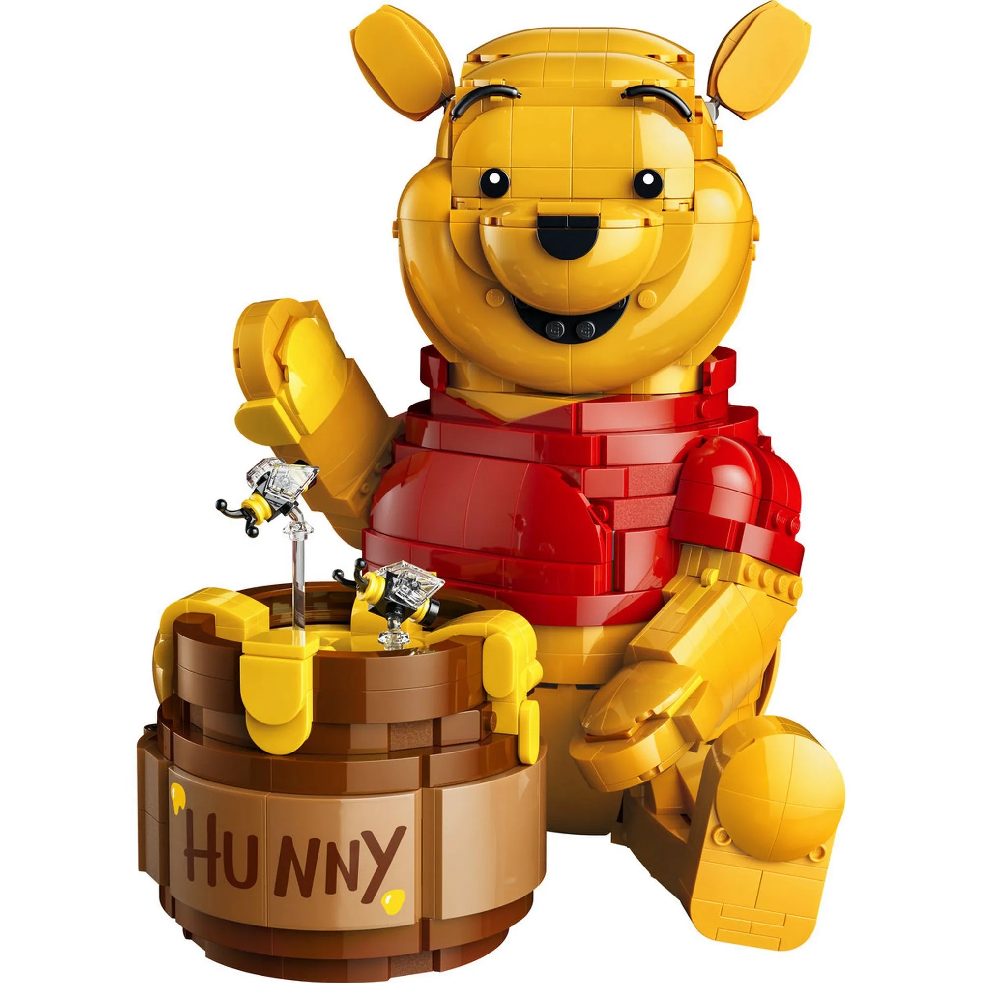 LEGO Disney Micimackó épített figura mézescsuporral és méhecskékkel, klasszikus Micimackó modell piros pólóban.