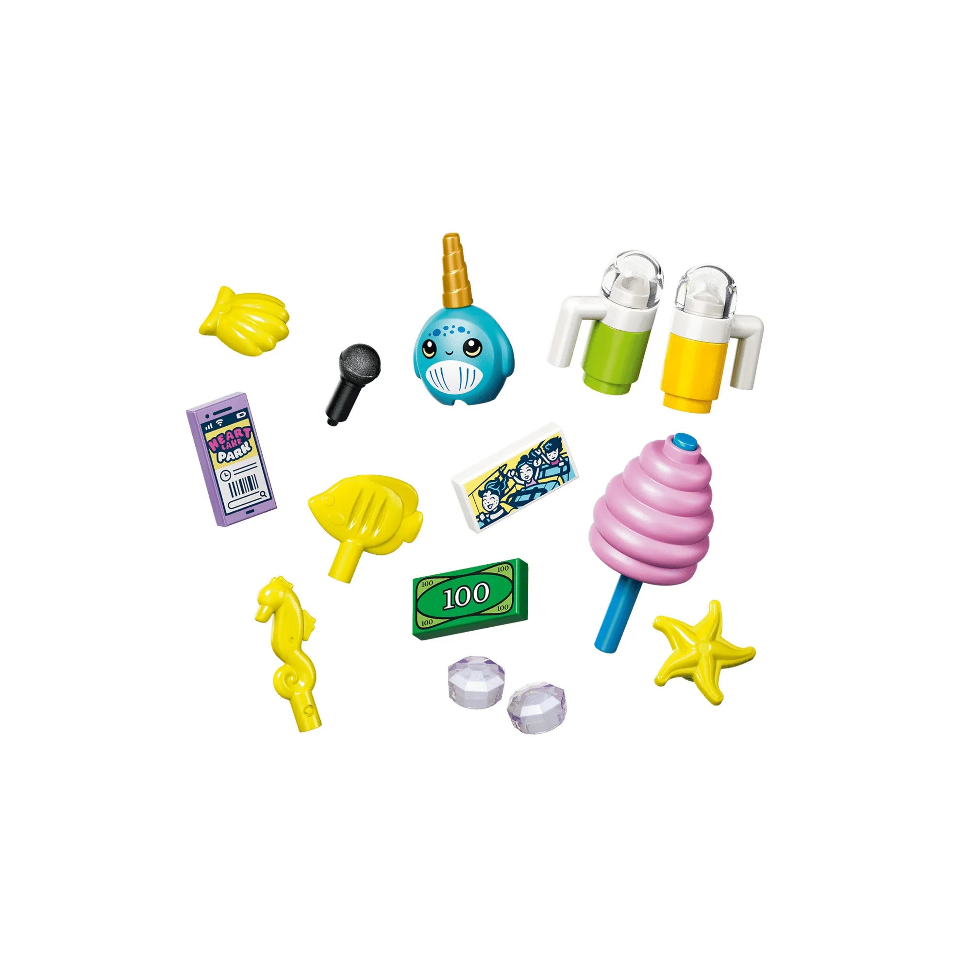 LEGO Friends: Hableányos hullámvasút 42703, 864 darabos készlet kiegészítő elemei, köztük vattacukor, üdítők, mikrofonok, pénz, kagylók és tengeri témájú dekorációk.