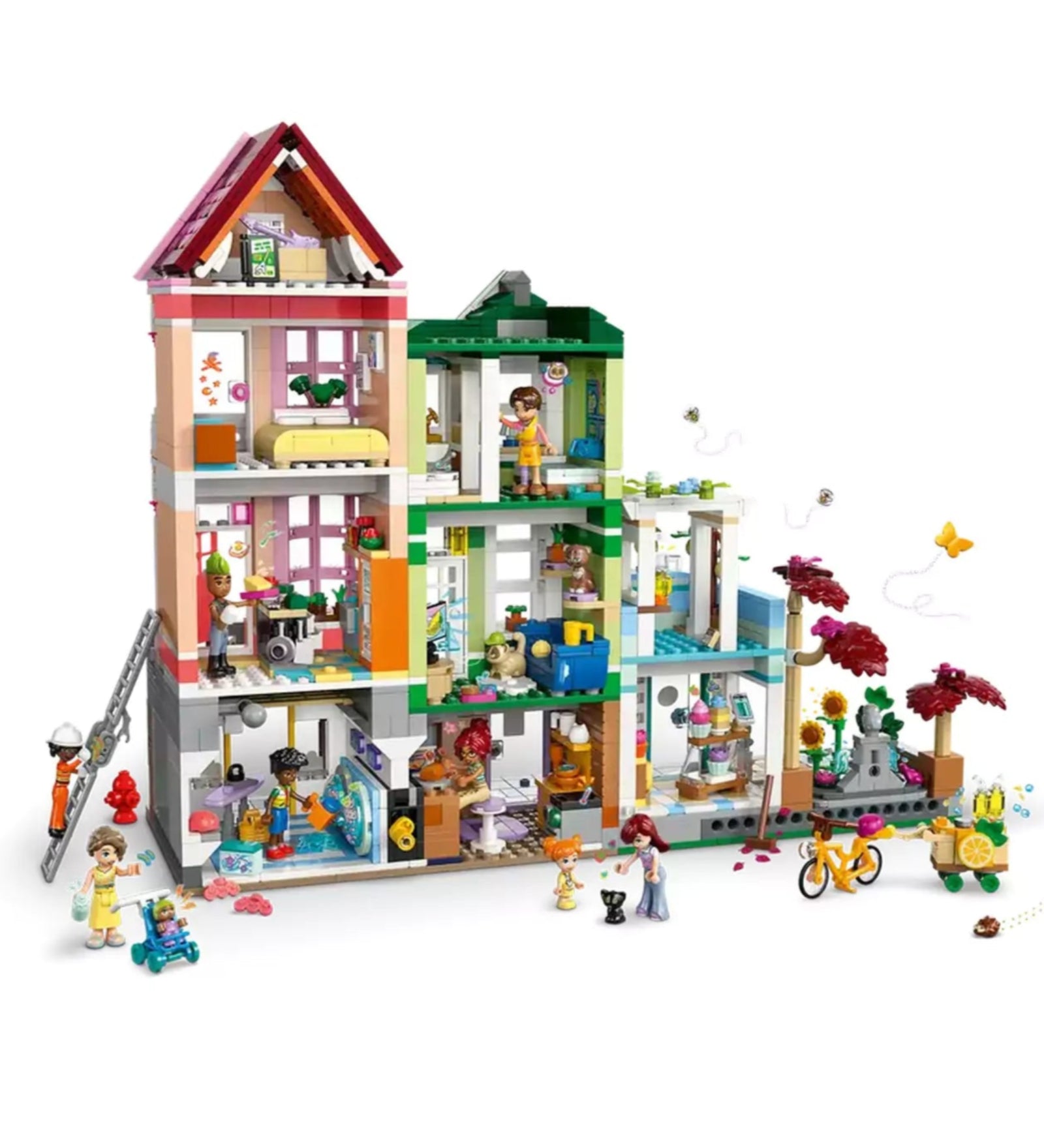 LEGO Friends Heartlake City lakások és üzletek 42670 modell, amely bemutatja a színes házak és üzletek külső és belső elemeit.