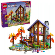 LEGO Friends Otthonos kabin az őszi erdőben készlet doboza és a megépített faházmodell együtt, részletgazdag erdei környezettel és kiegészítőkkel.
