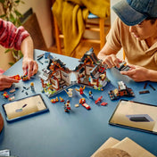 LEGO NINJAGO: Négy Fegyver Kovácsműhely, 15. évforduló építés közben, gyerekek asztalnál, elemekkel és digitális útmutatóval.