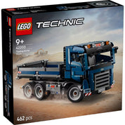 LEGO Technic Billenőplatós teherautó (42203) doboza szemből, homokos építkezési háttérrel.