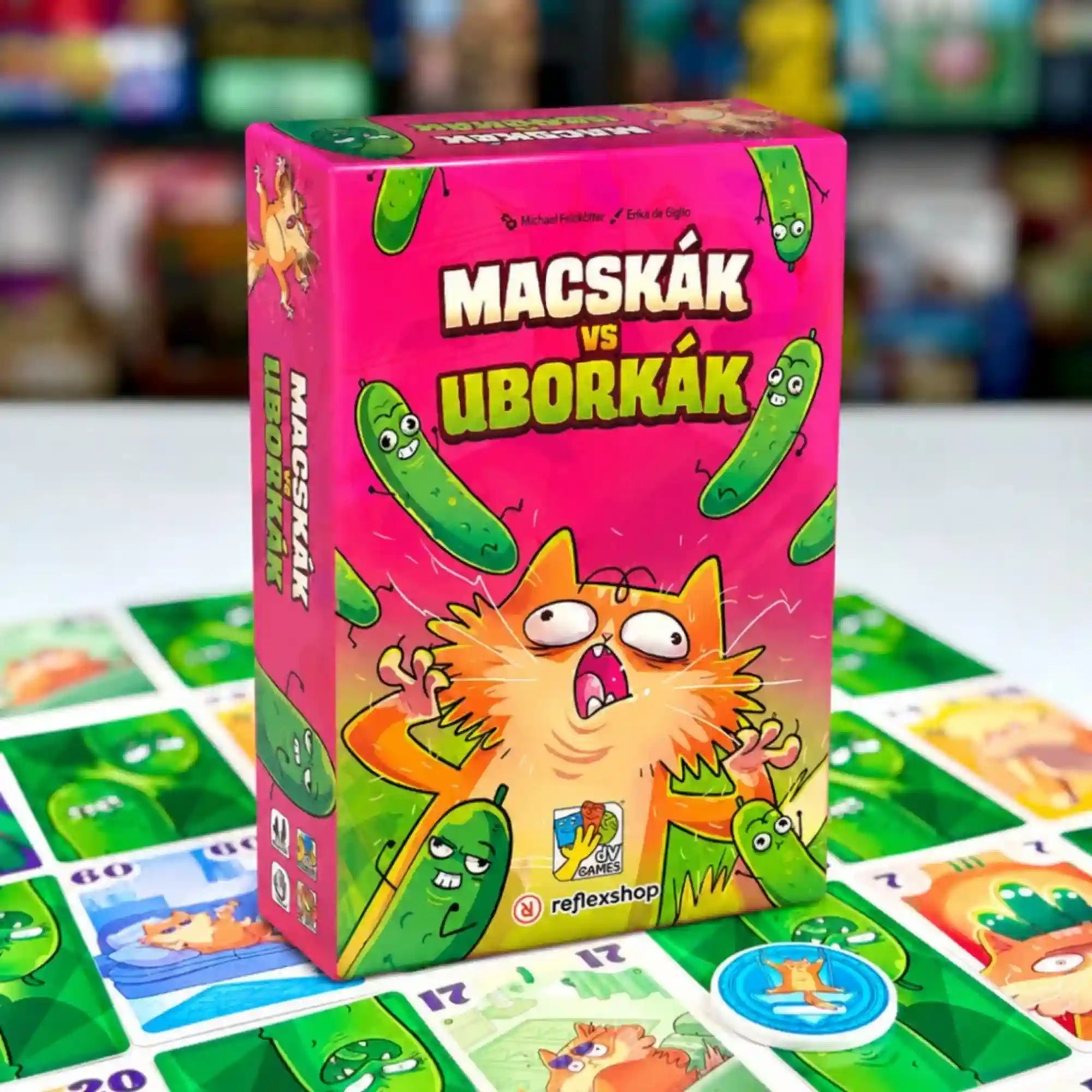 Macskák vs. uborkák magyar nyelvű társasjáték doboza kártyákkal és játékjelölővel.