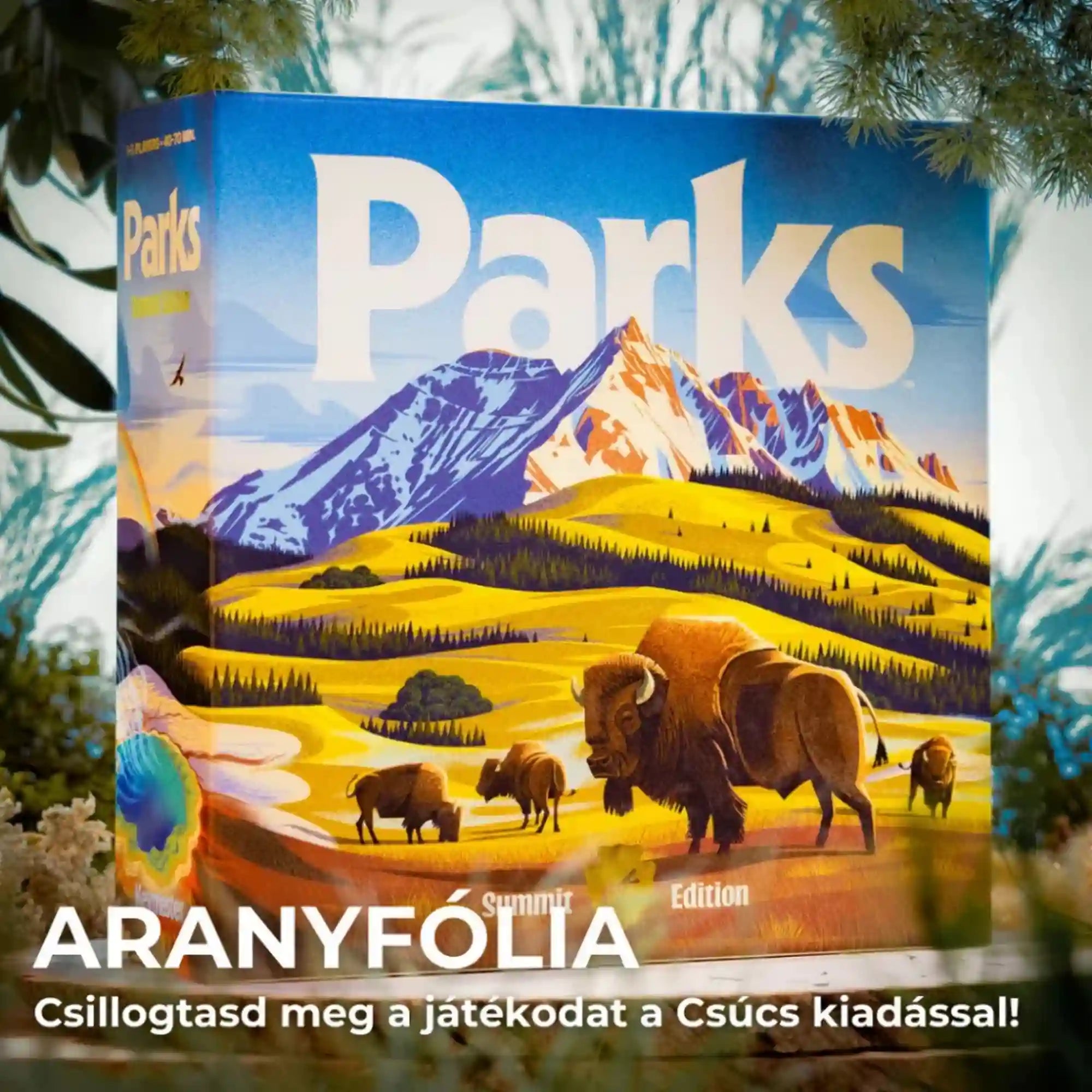 Parks Csúcs kiadás társasjáték doboza természetes környezetben, hegyekkel, bölényekkel és aranyfóliás „Summit Edition” felirattal