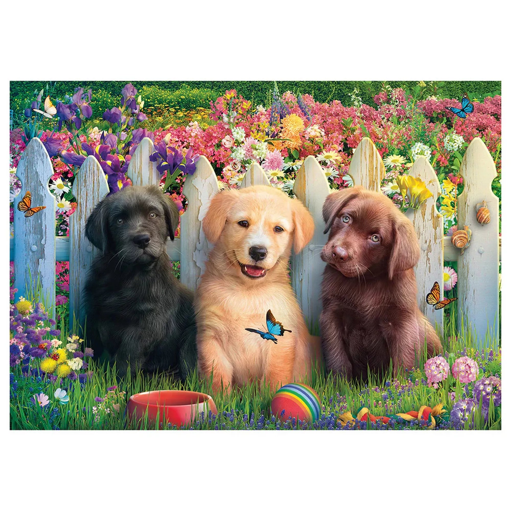 Schmidt Puzzle 1000 darabos kirakott képe, három kölyökkutyával színes virágok között, kertben ülve, vidám és részletgazdag illusztrációval