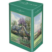 Puzzle Schmidt: Thomas Kinkade, Egy tökéletes nyári nap, 500 darabos puzzle fémdoboza, amely a festői vidéki házat, virágos kertet és legelésző lovakat ábrázoló Thomas Kinkade grafikával díszített.